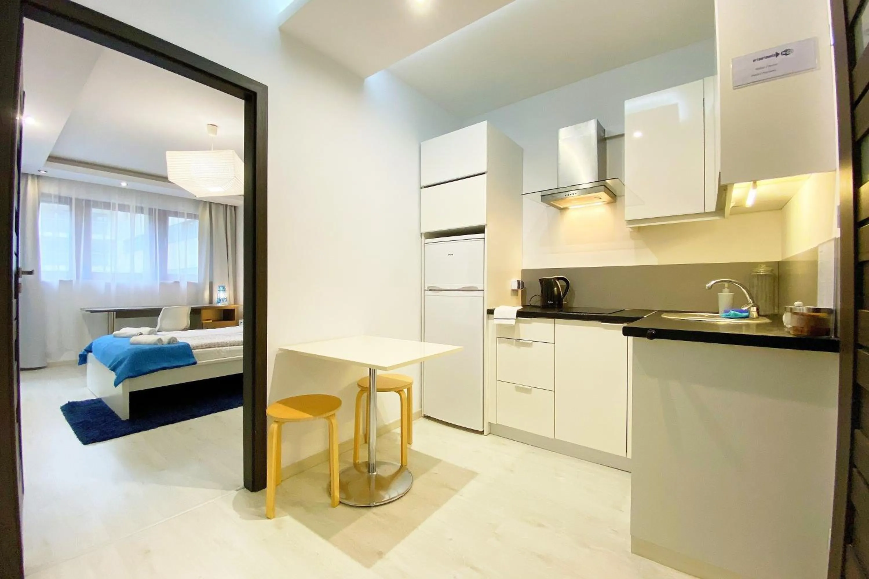 Kitchen or kitchenette, Bed in erApartments Oxygen Residence