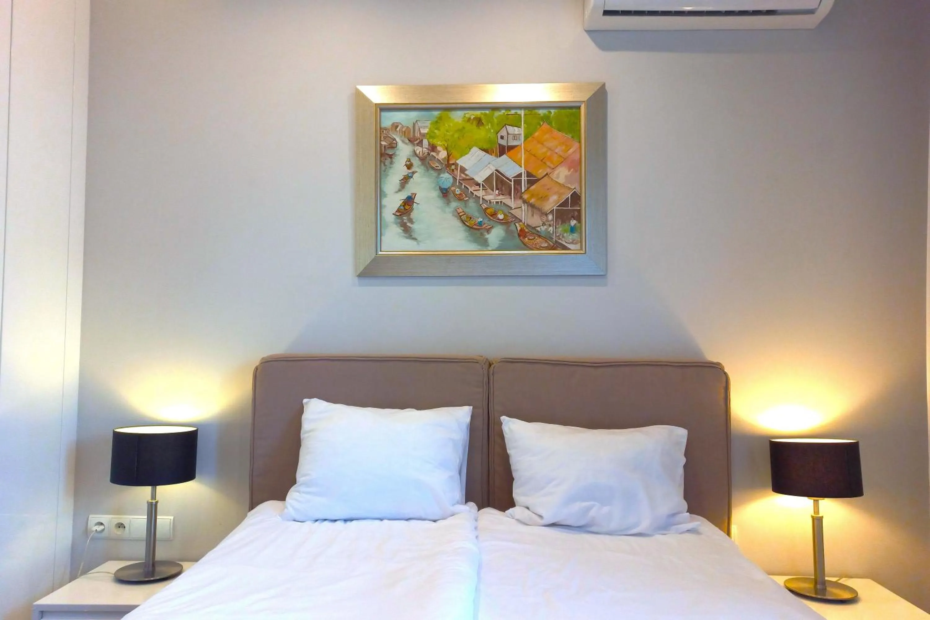 Bed in erApartments Oxygen Residence