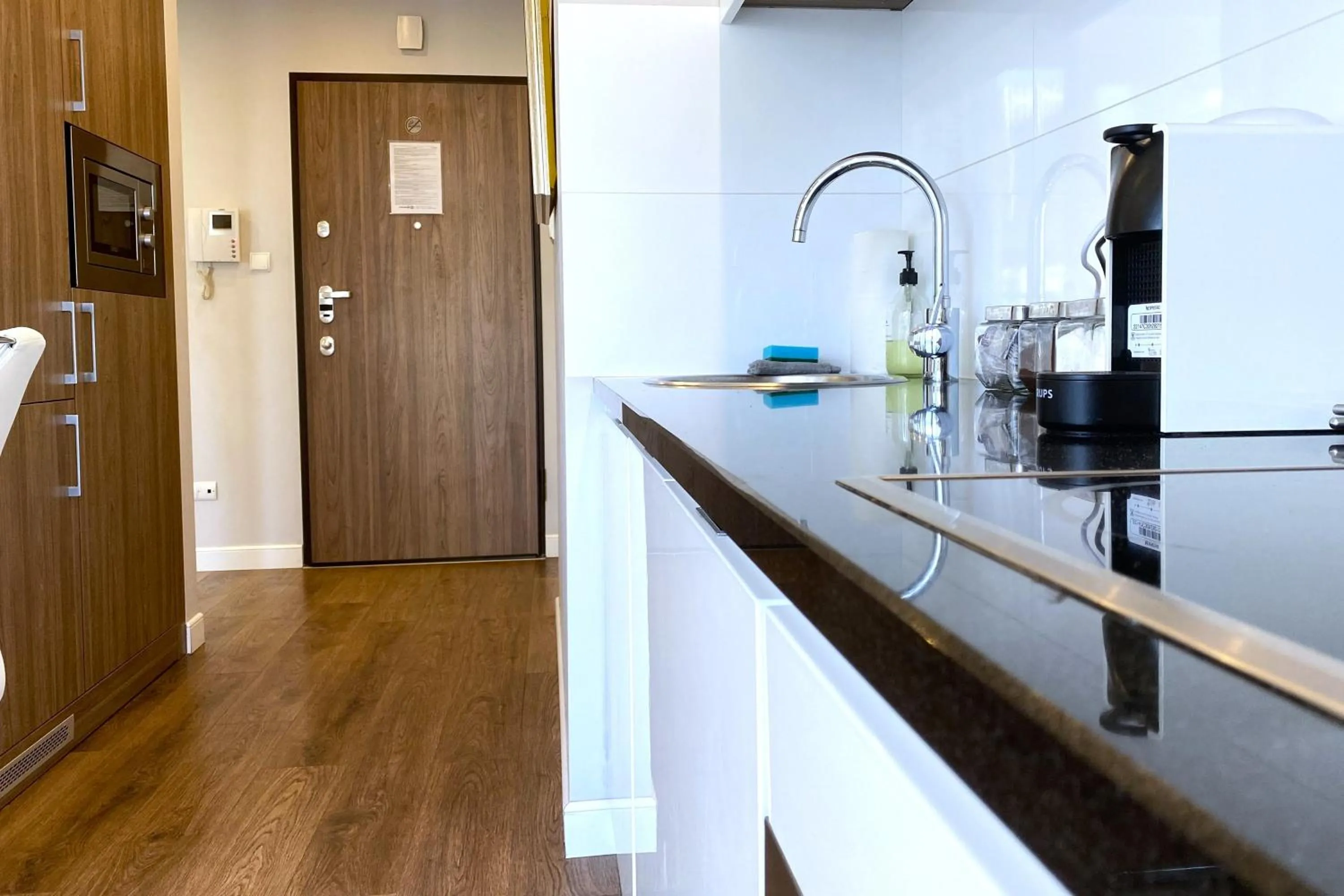 Kitchen or kitchenette in erApartments Oxygen Residence