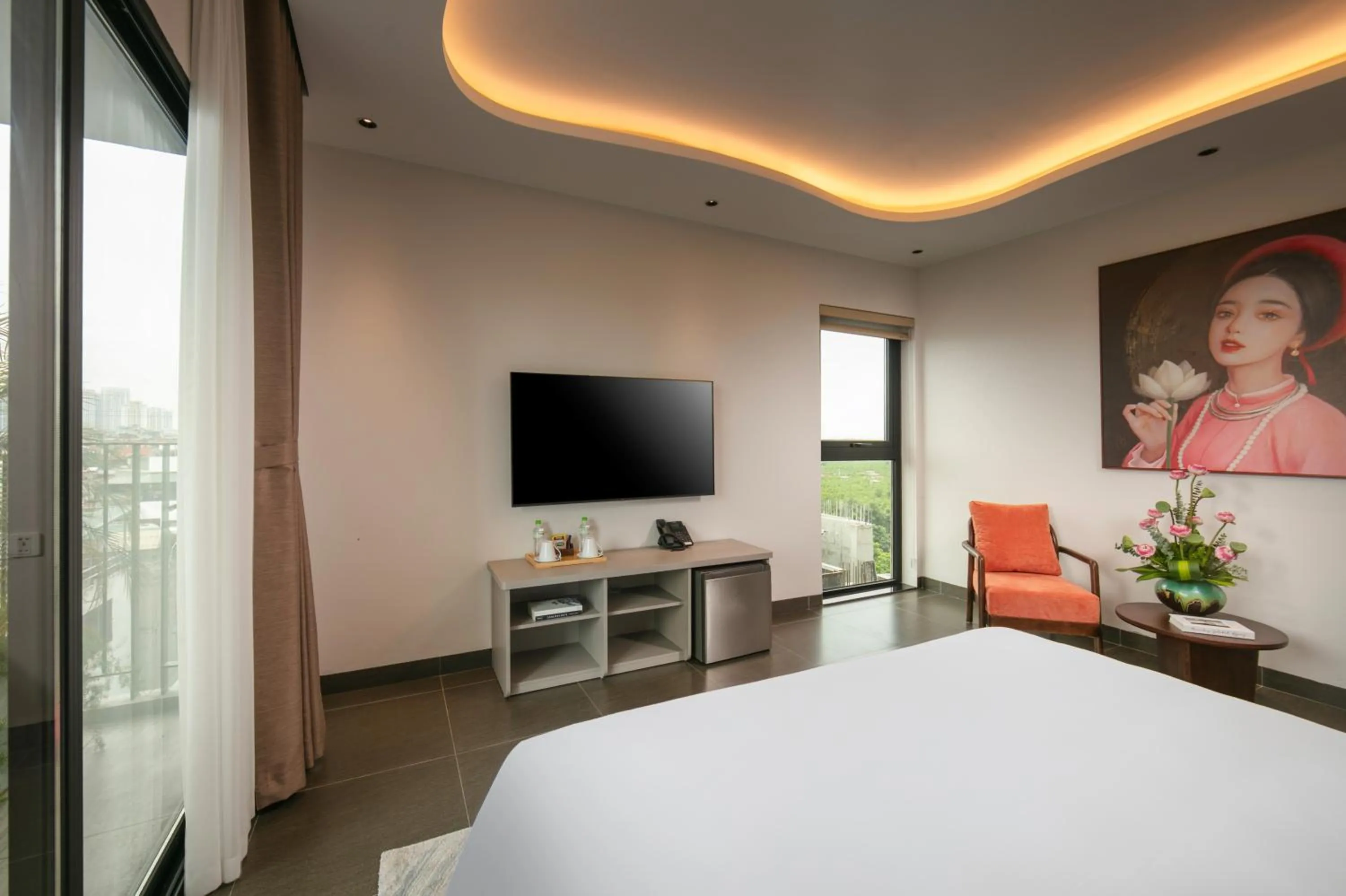 Communal lounge/ TV room, Bed in Hanoi Riverview Boutique Hotel & Apartment