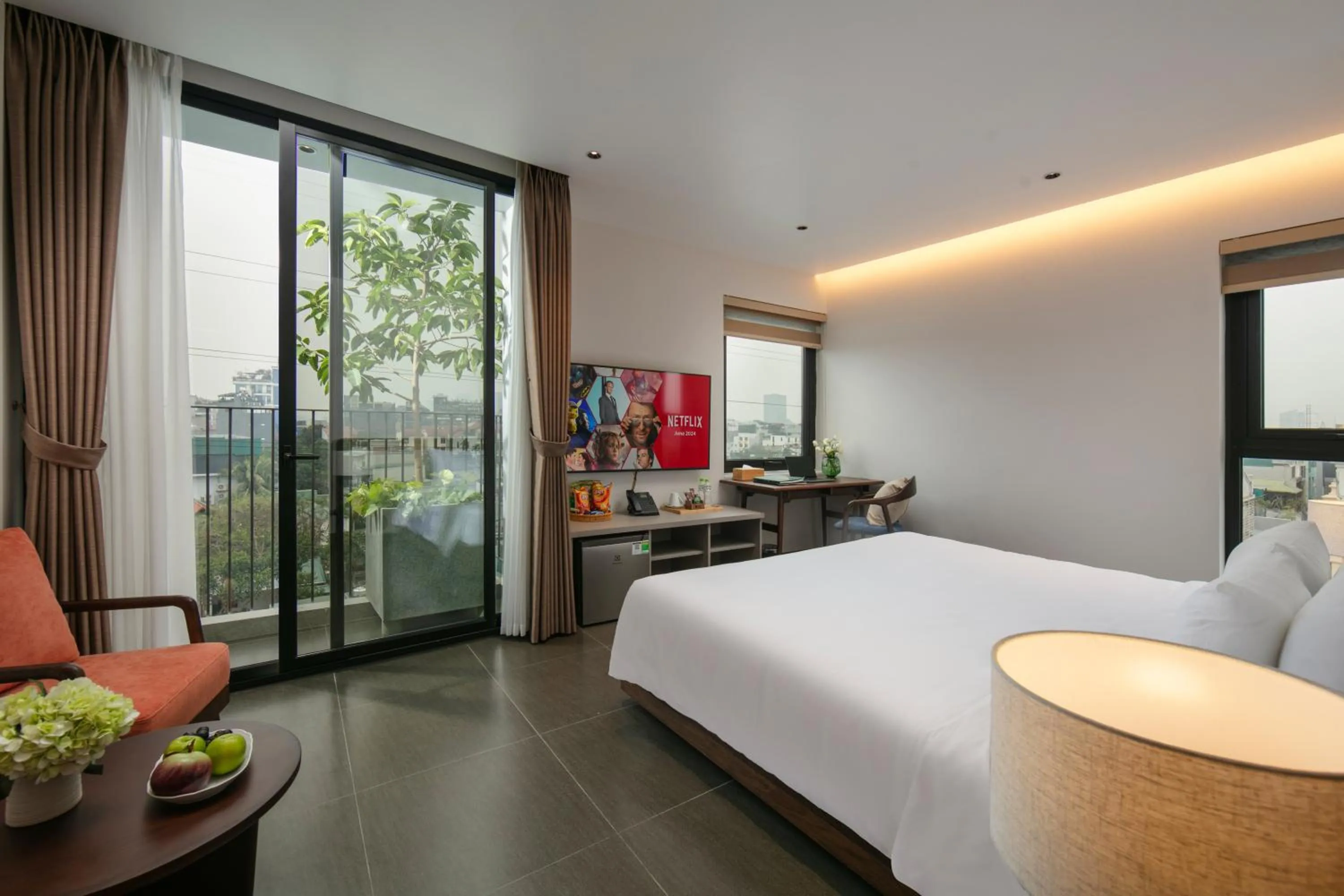 Communal lounge/ TV room, Bed in Hanoi Riverview Boutique Hotel & Apartment