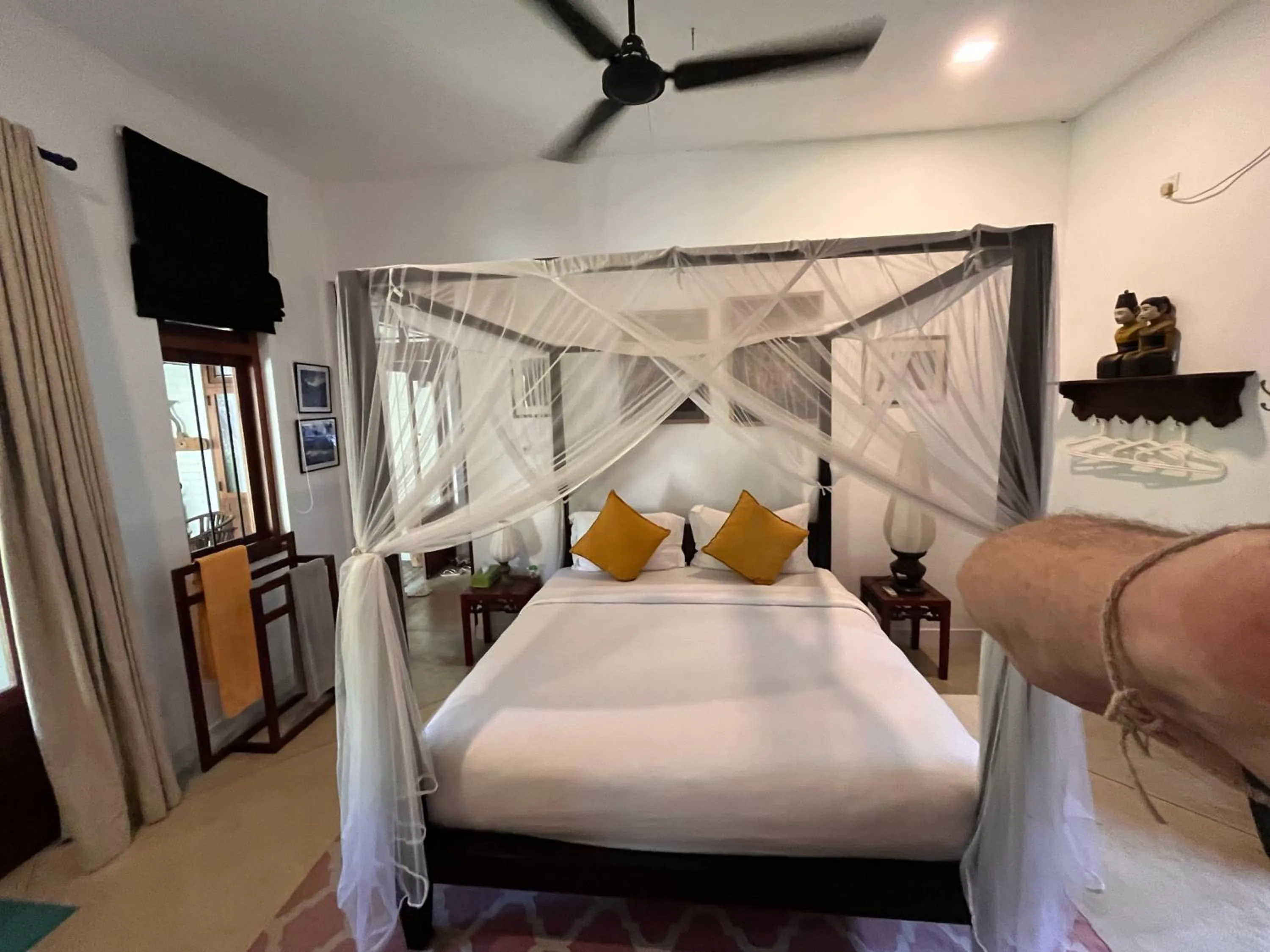 Bed in Calamansi Cove Villas