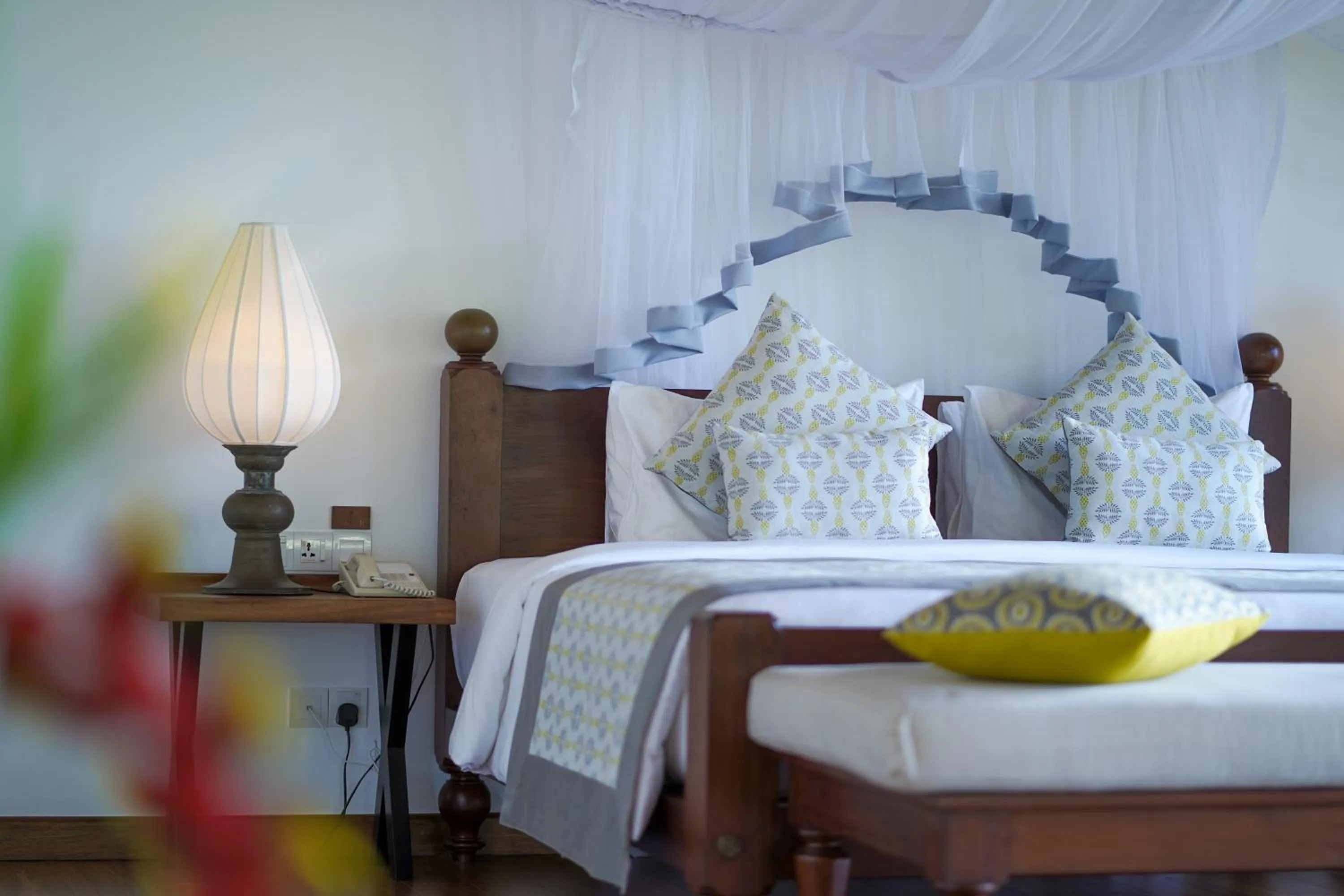 Bed in Calamansi Cove Villas