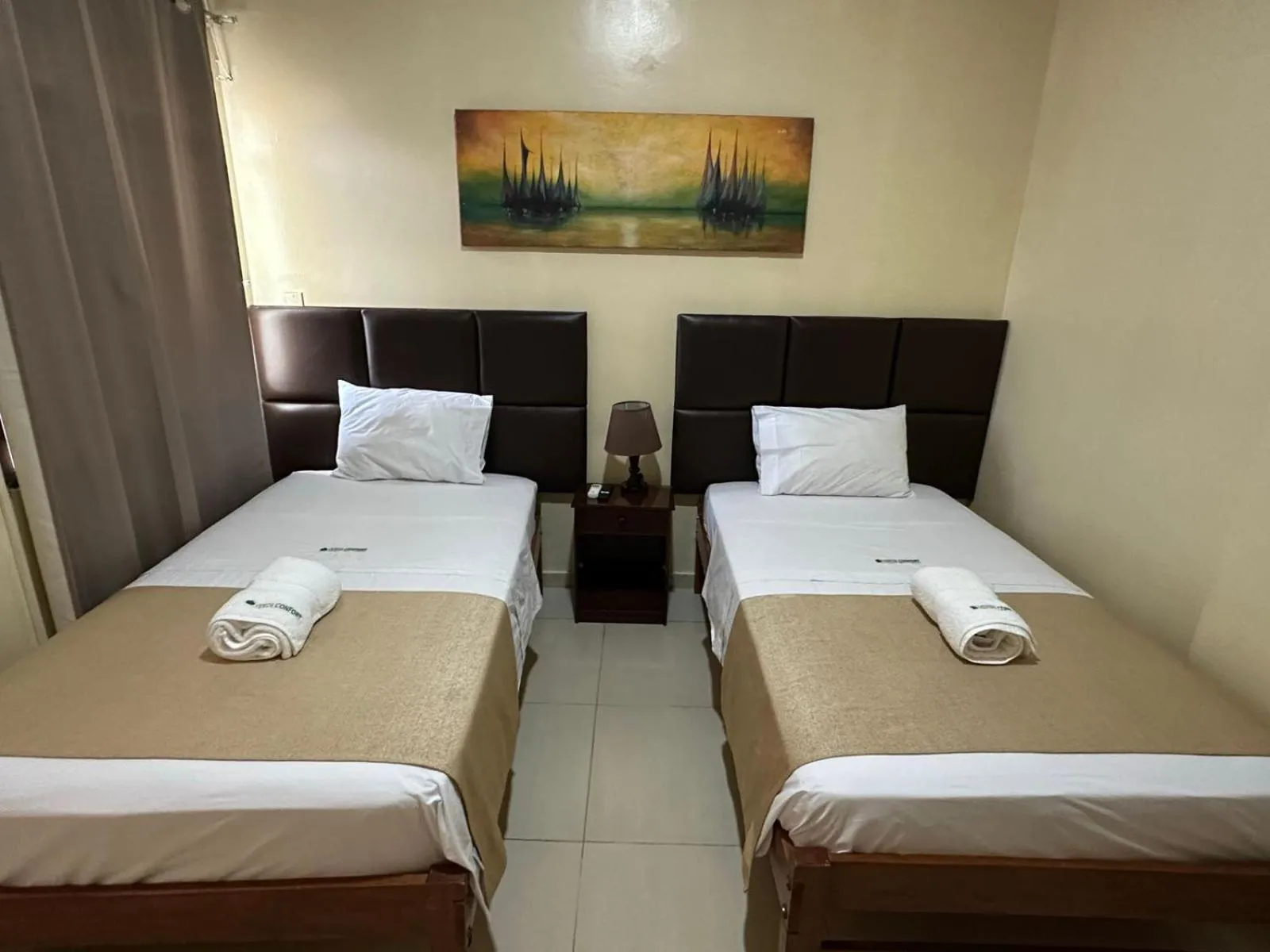 Photo of the whole room, Bed in Doral Inn Hotel - Iquitos