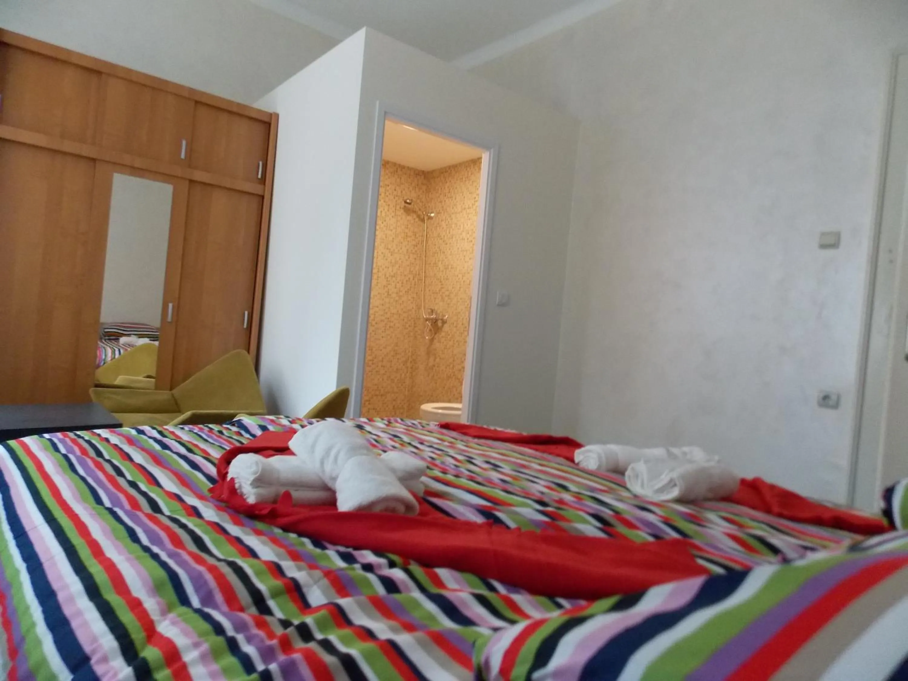 Bathroom, Bed in Guest House Miss Depolo