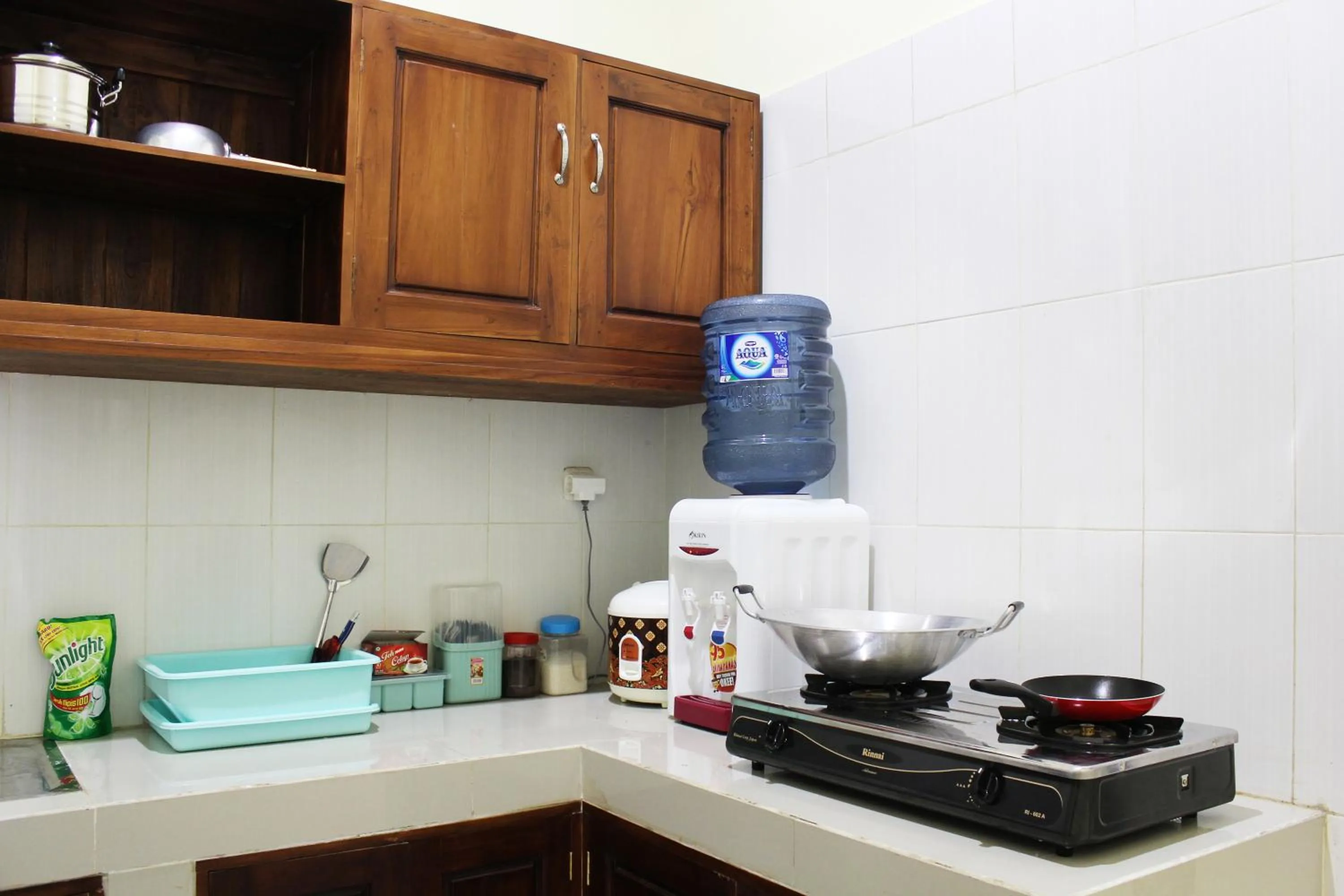 Communal kitchen in House of Dharmawan