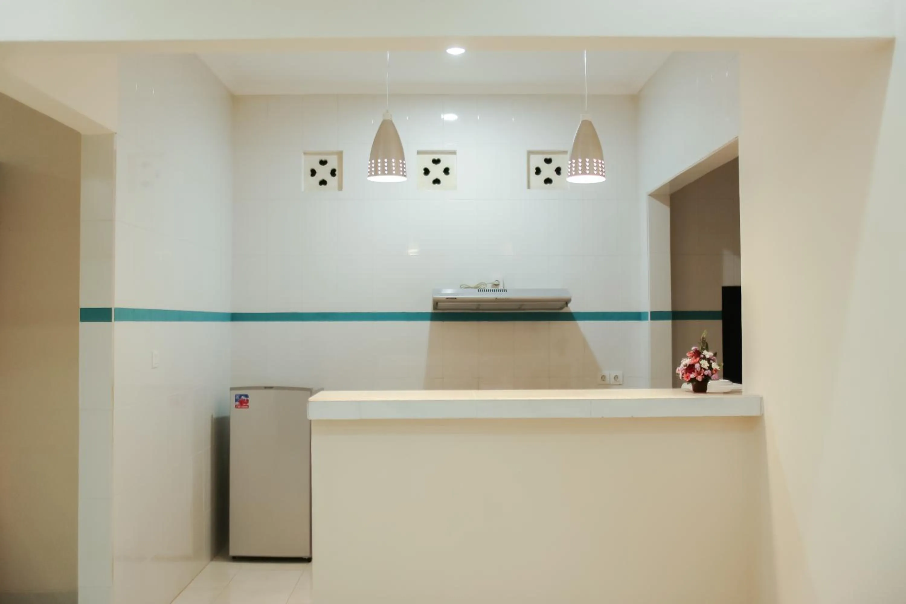 Kitchen or kitchenette in Wingsu Guest House