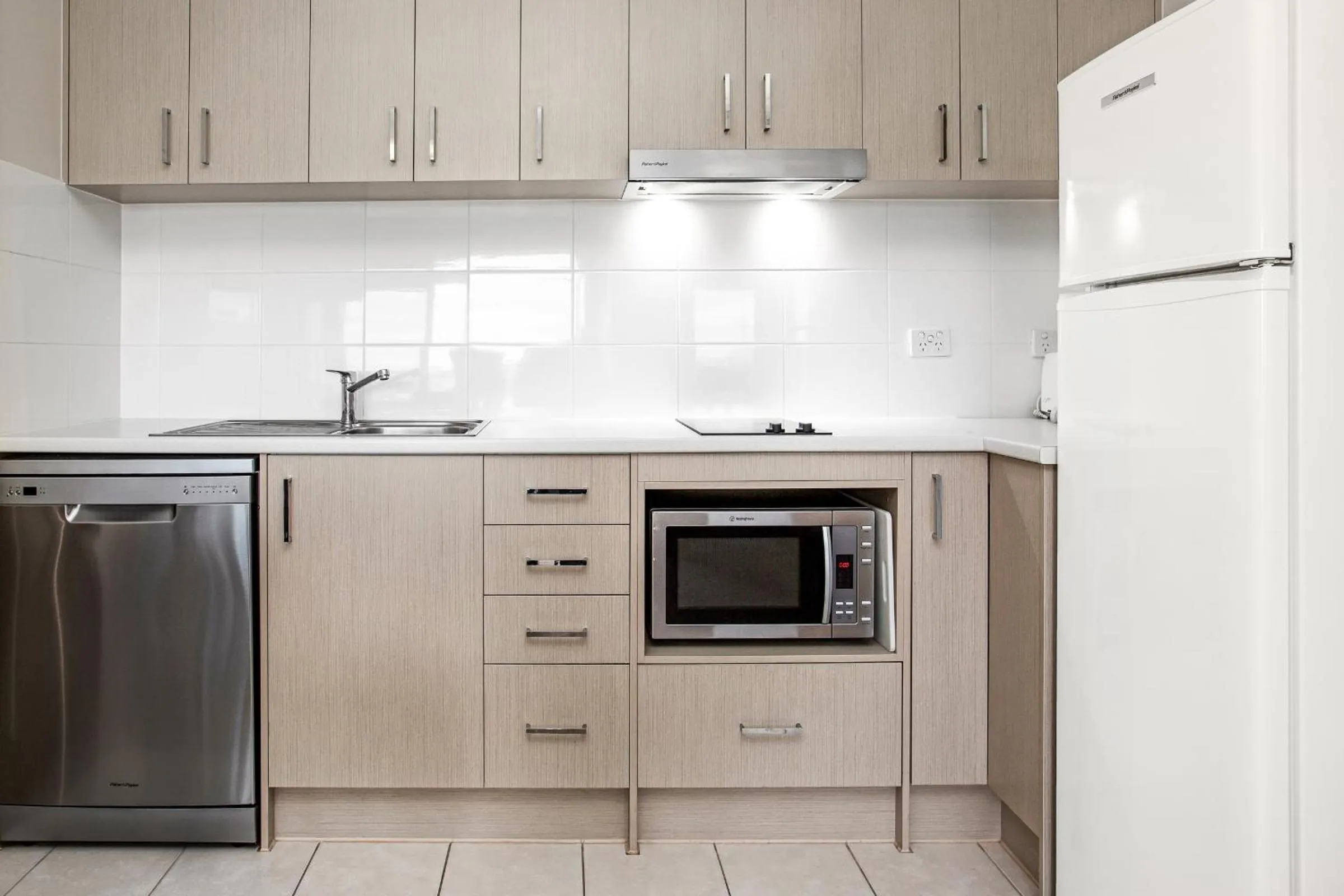 Kitchen or kitchenette in Hume Serviced Apartments