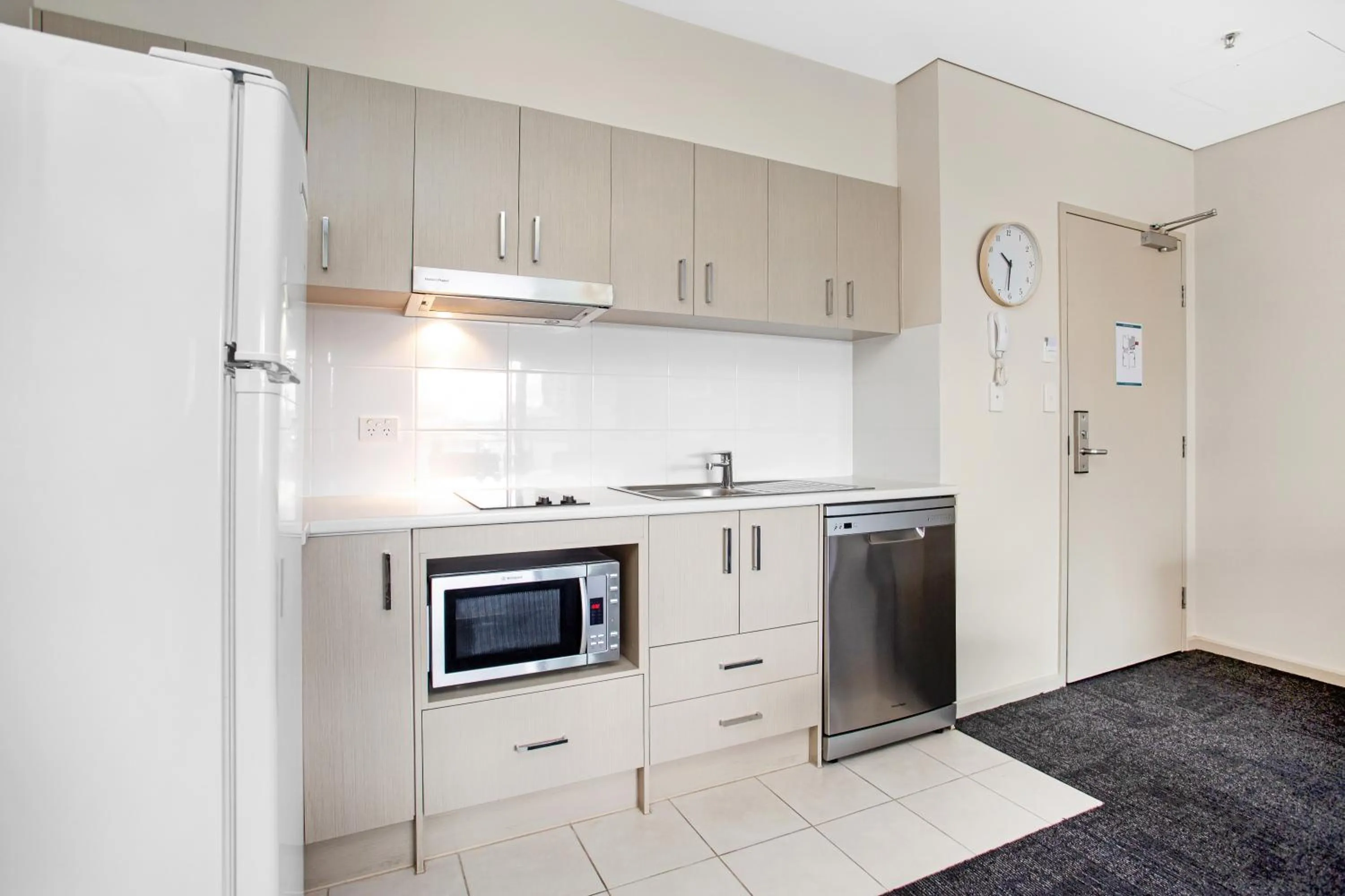 Kitchen or kitchenette in Hume Serviced Apartments