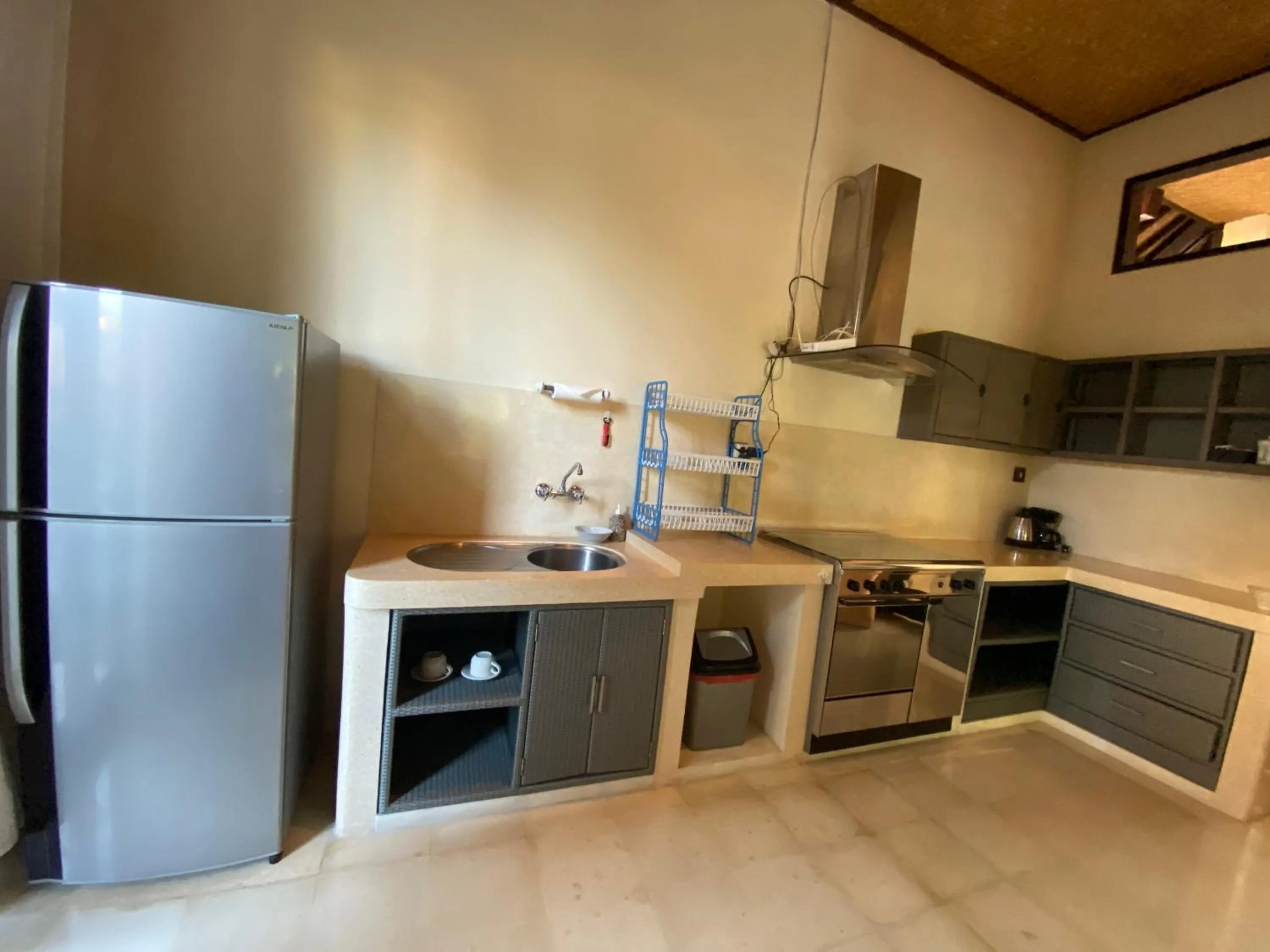 Kitchen or kitchenette in Rumah Dadong