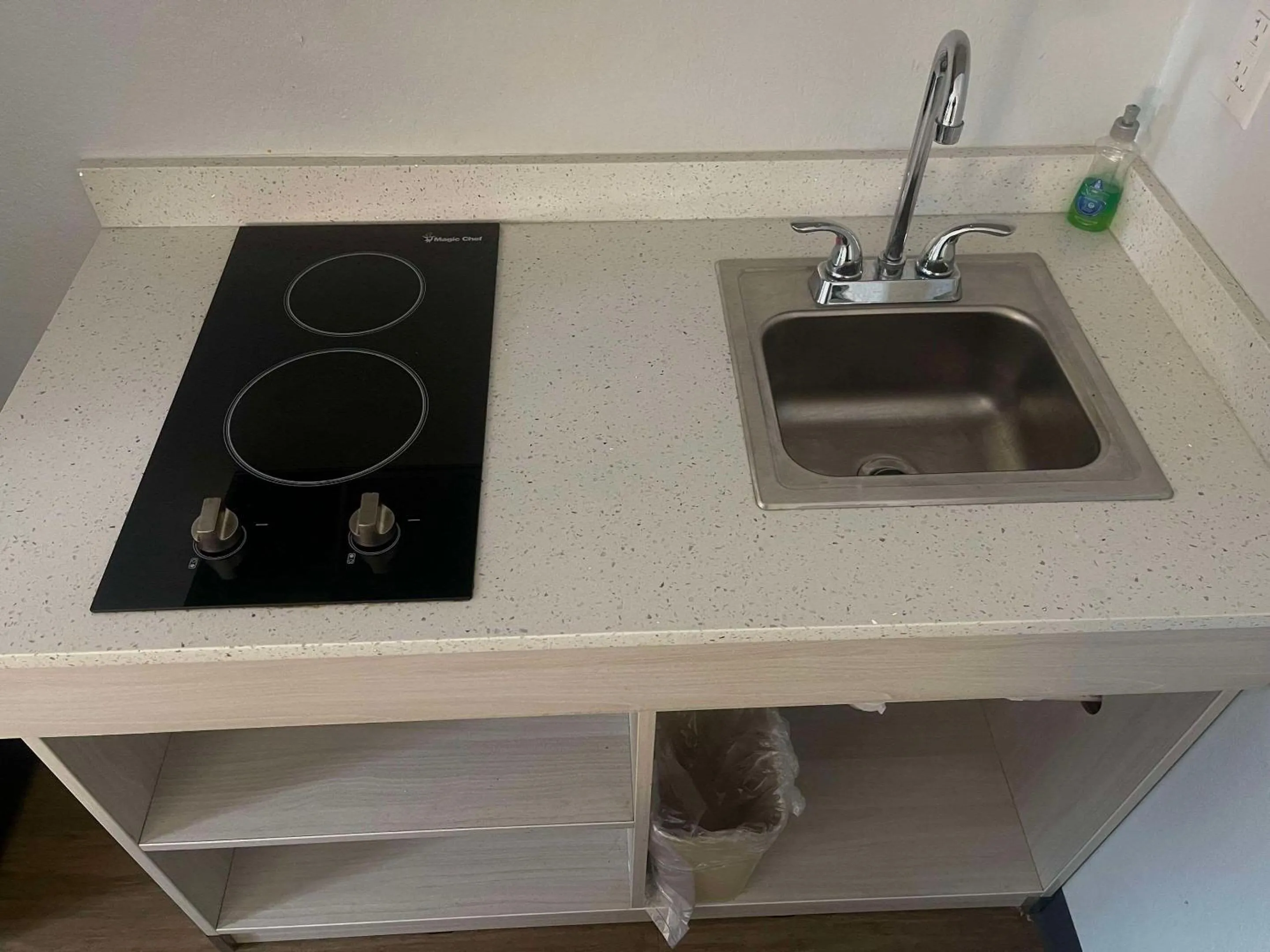 Kitchen or kitchenette in Suburban Studios East Syracuse Carrier Circle