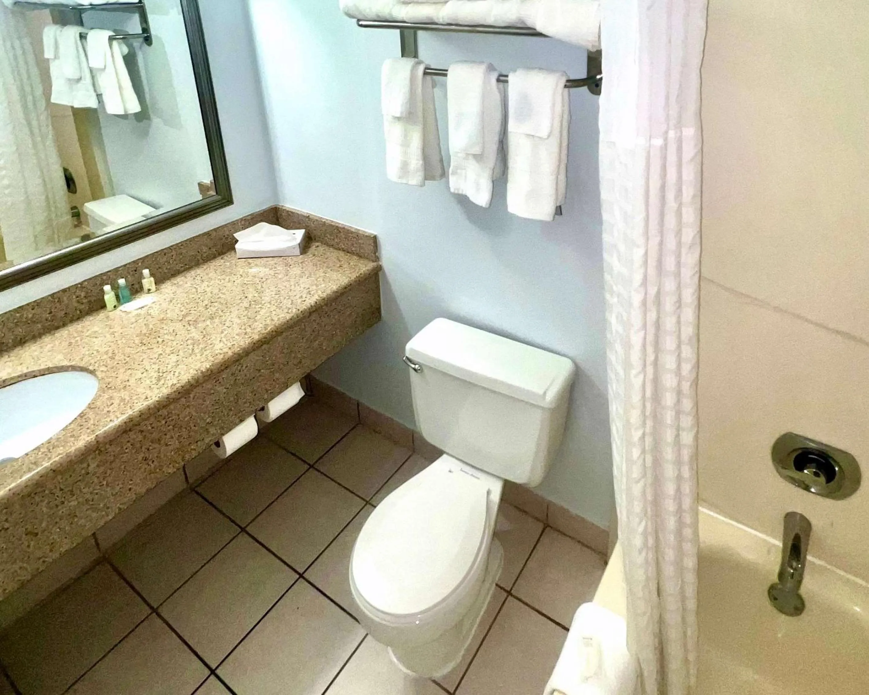 Bedroom in Suburban Studios East Syracuse Carrier Circle