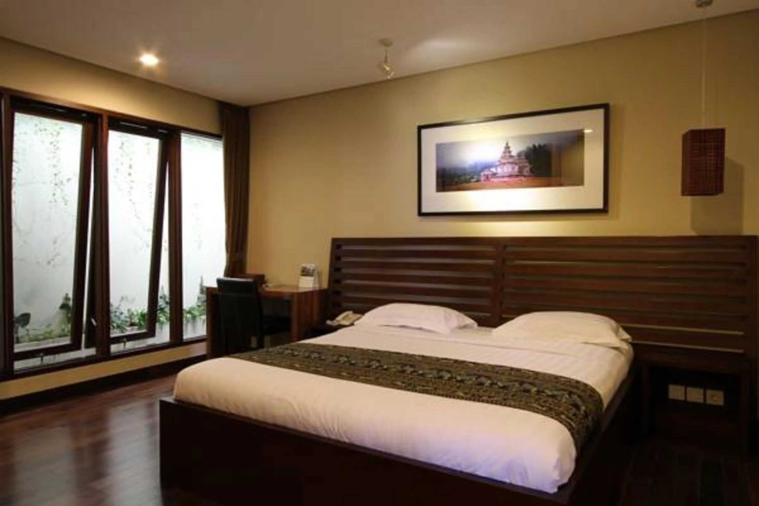 Library, Bed in Java Go Residence by Jiwa Jawa