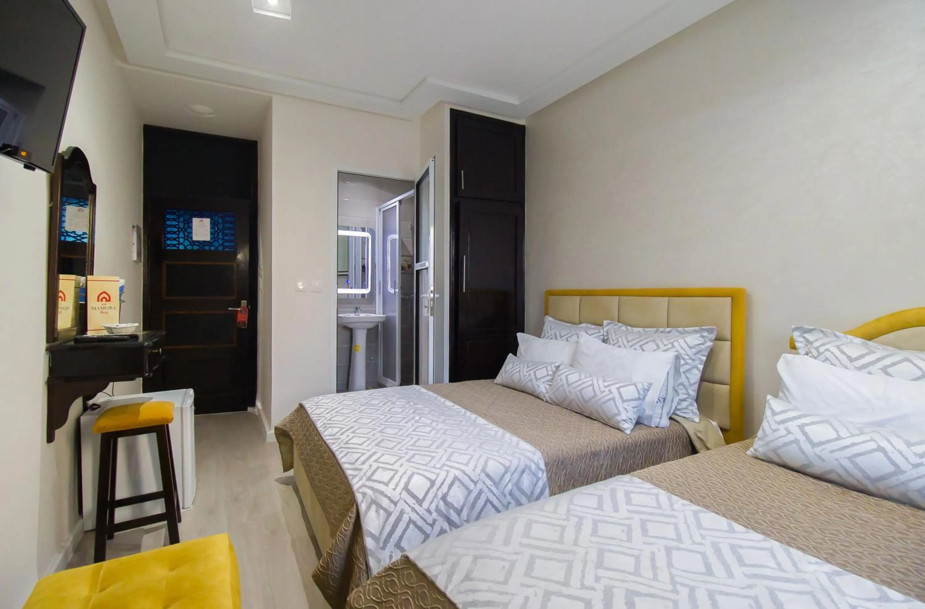 Photo of the whole room, Bed in Mamora Bay