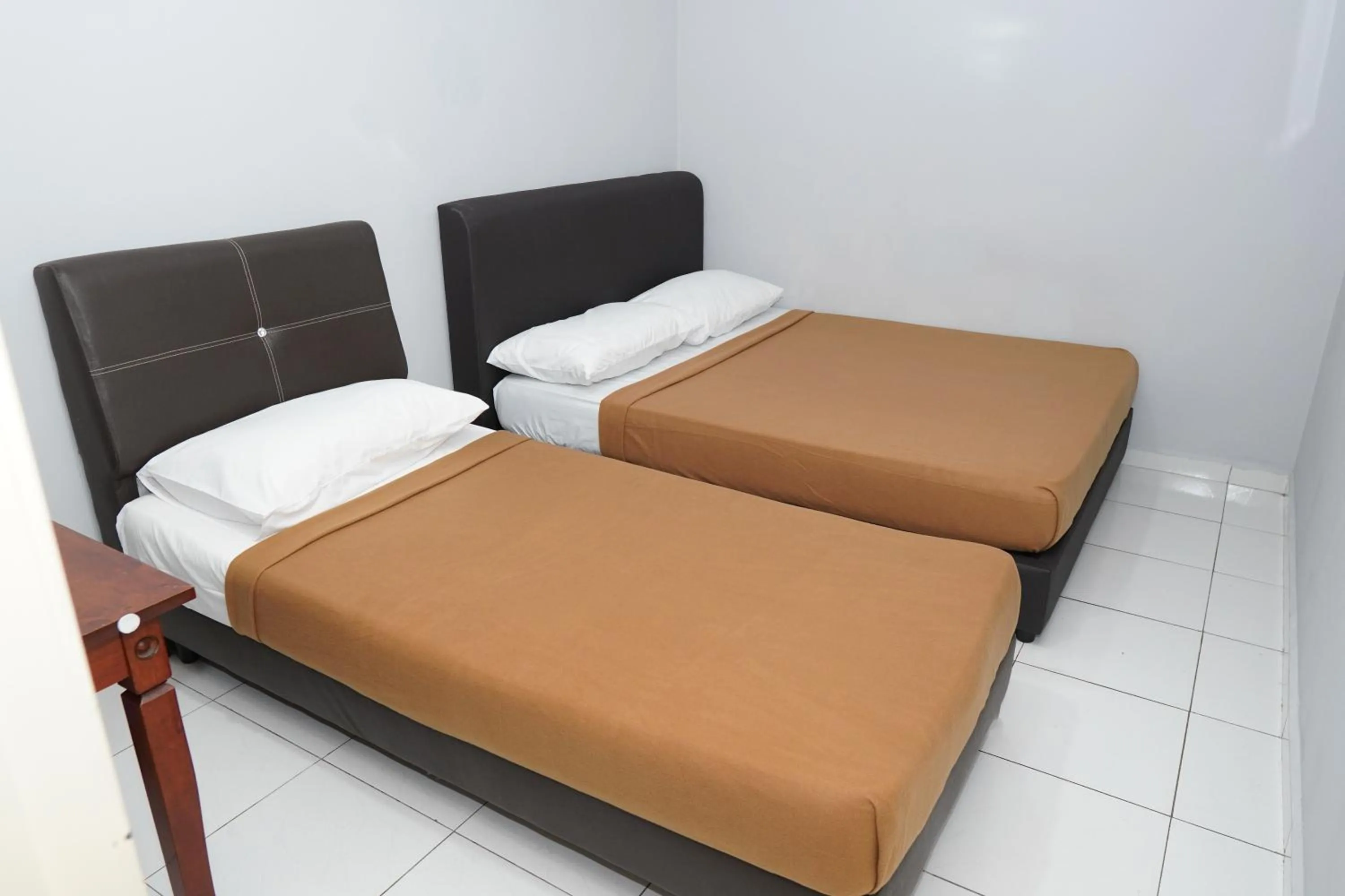 Bed in Hotel Sixty Nine