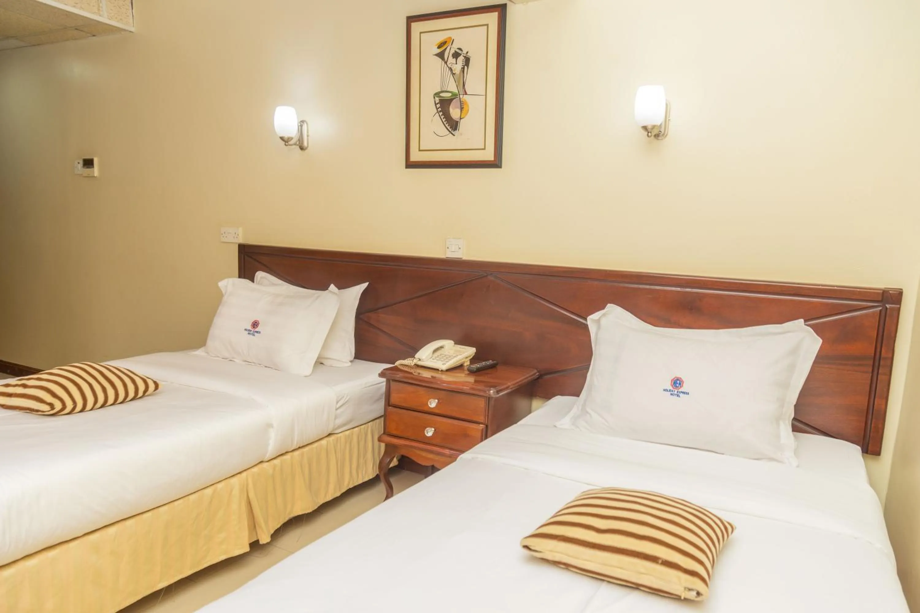 Bed in Holiday Express Hotel Kampala