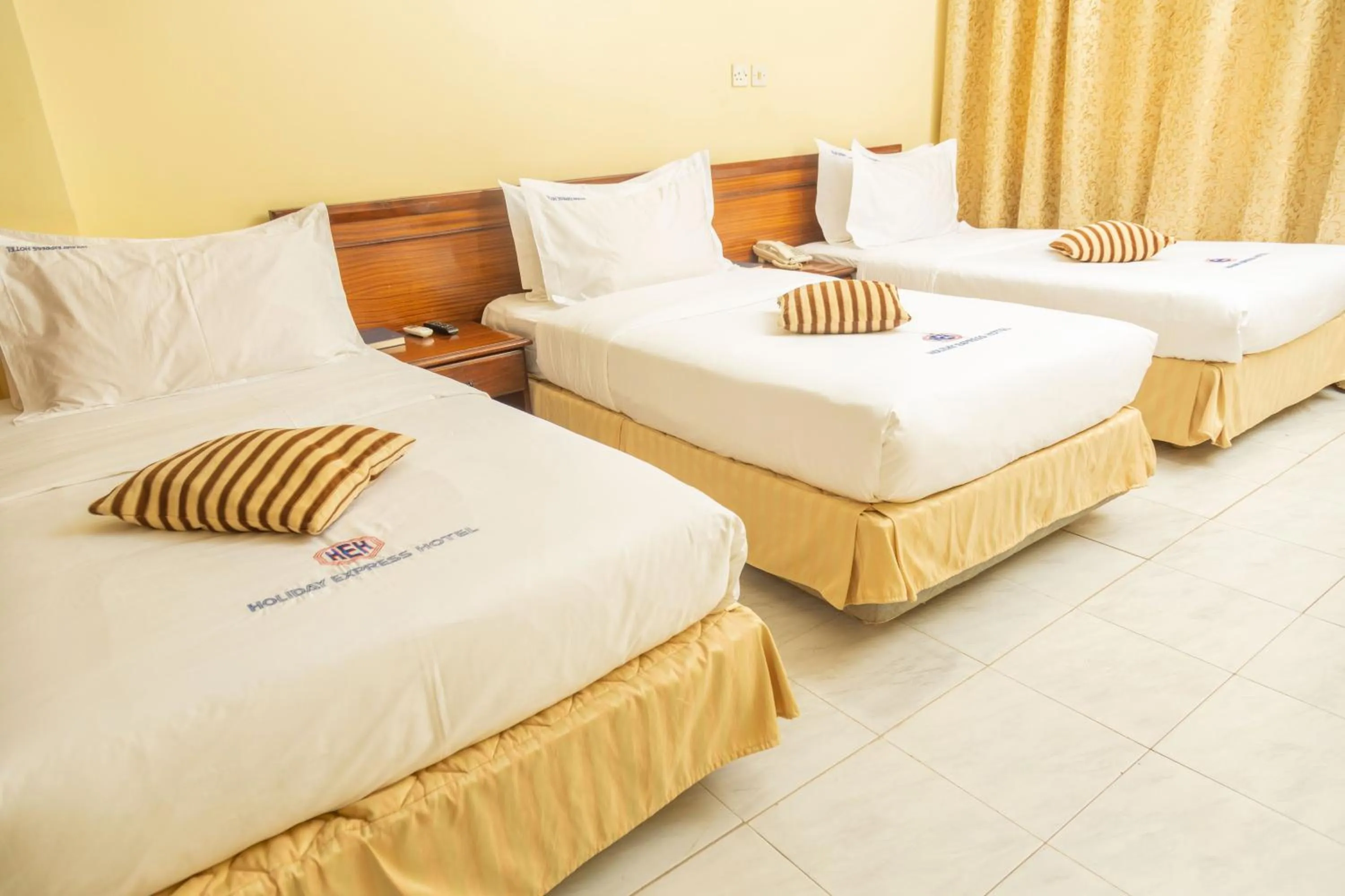 Bed in Holiday Express Hotel Kampala