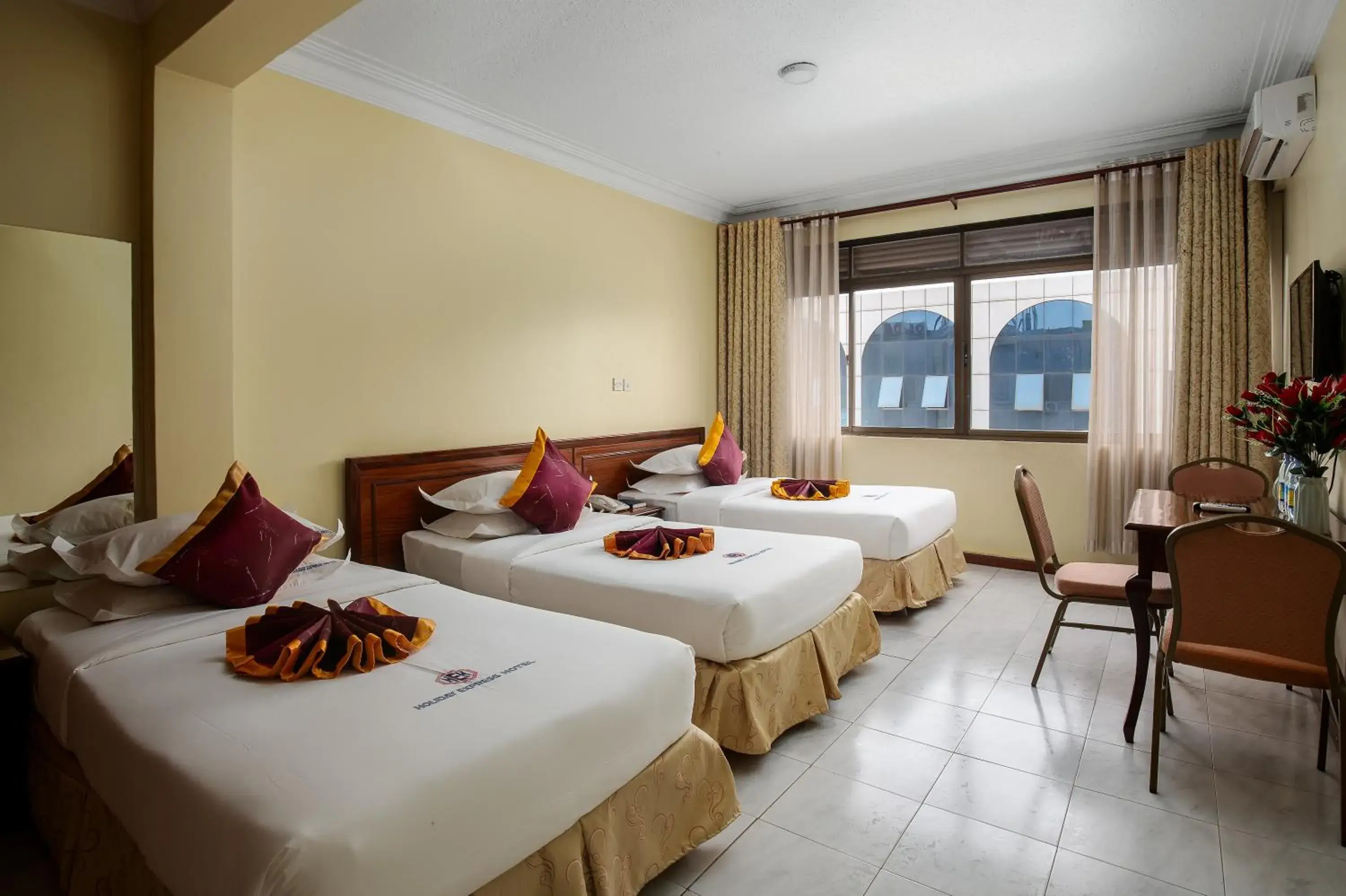 Classic Triple Room in Holiday Express Hotel Kampala Classic Triple Room in Holiday Express Hotel Kampala