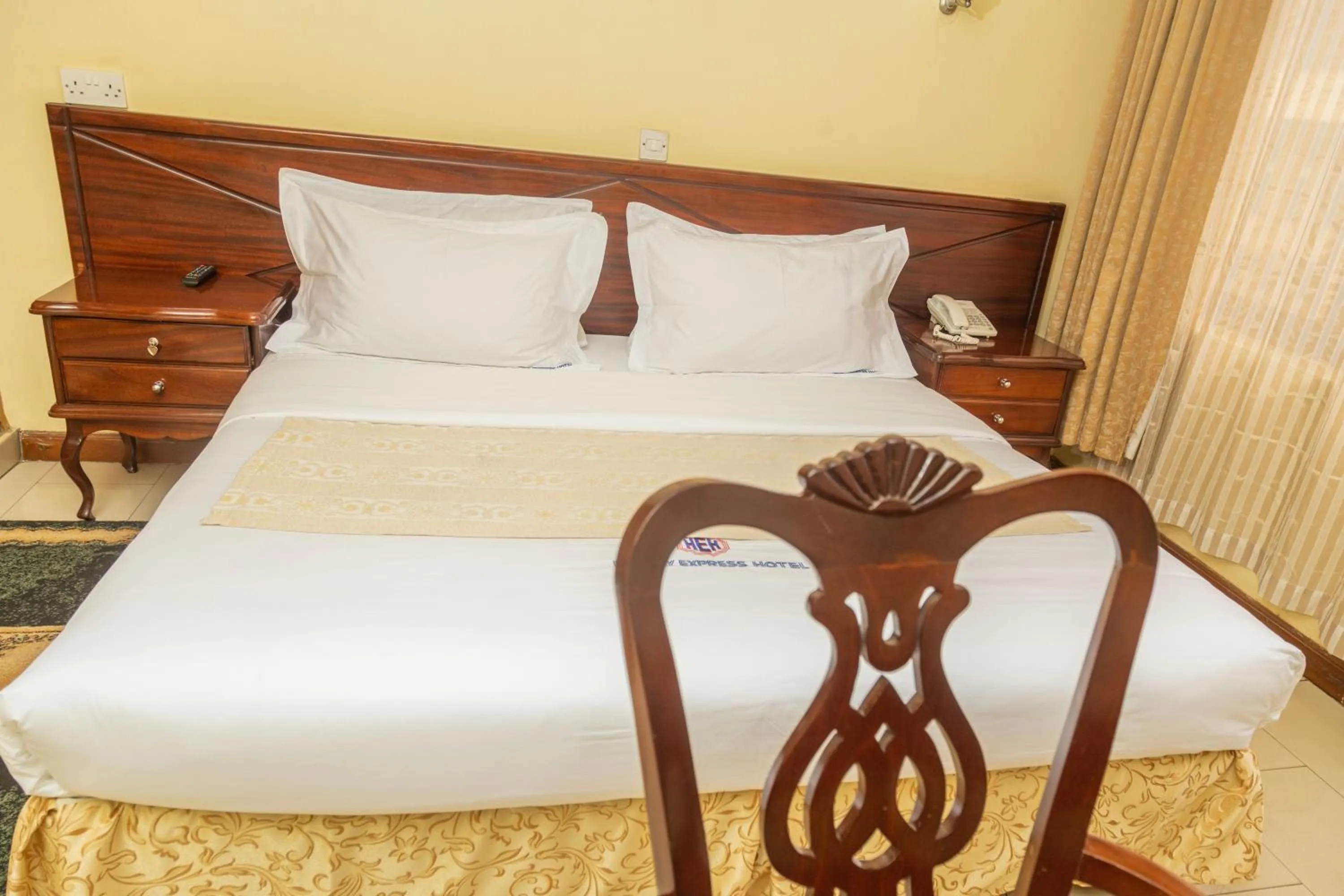 Bed in Holiday Express Hotel Kampala