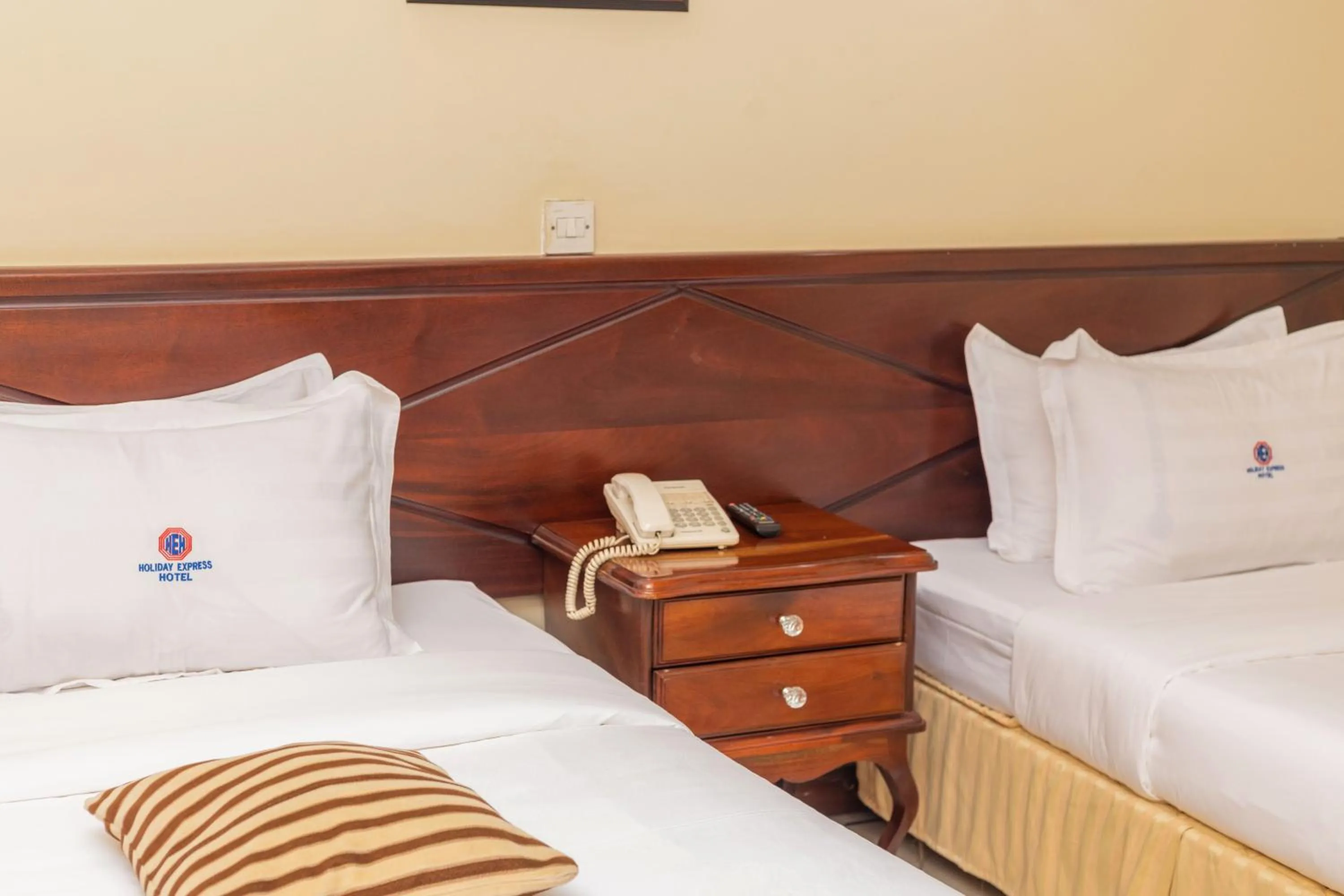 Bed in Holiday Express Hotel Kampala