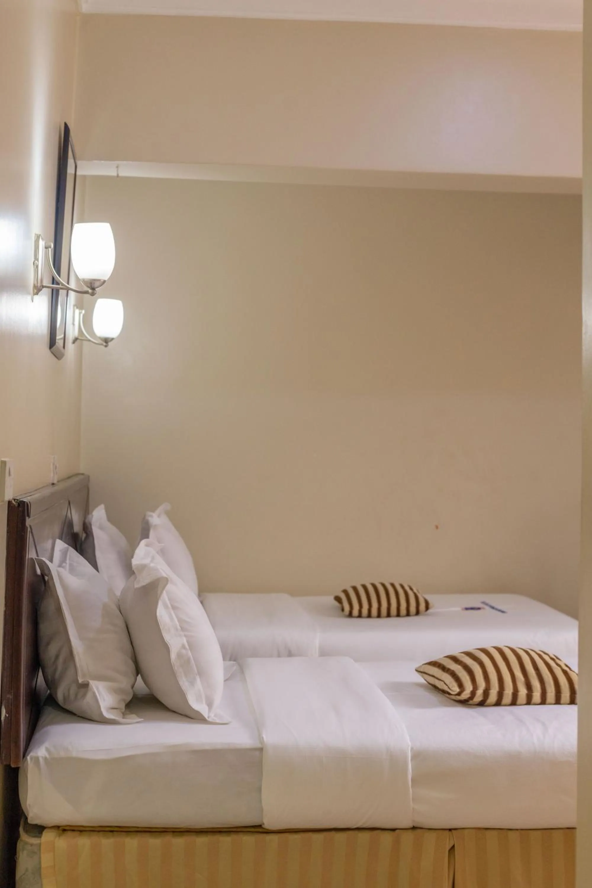 Bed in Holiday Express Hotel Kampala