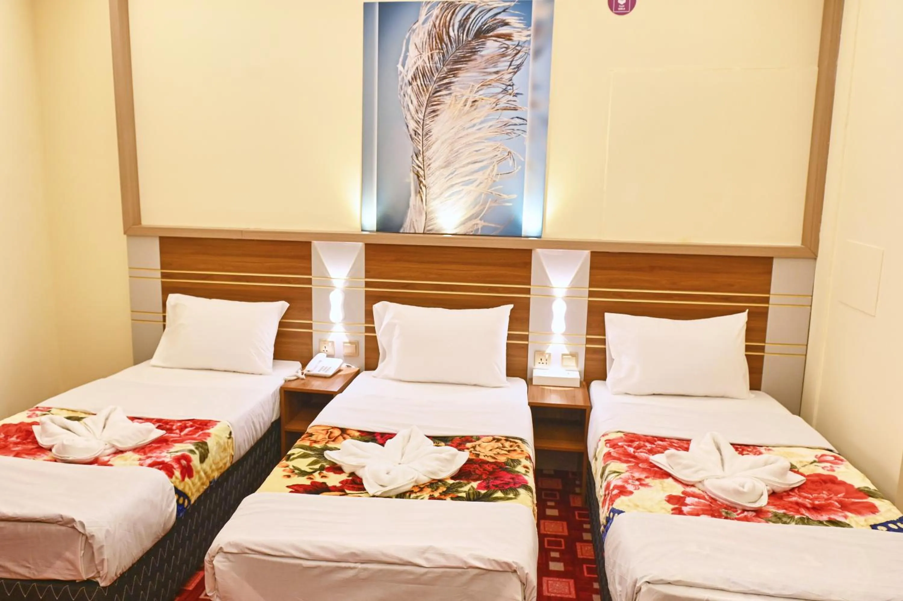 Bed in Tanha Palace Hotel