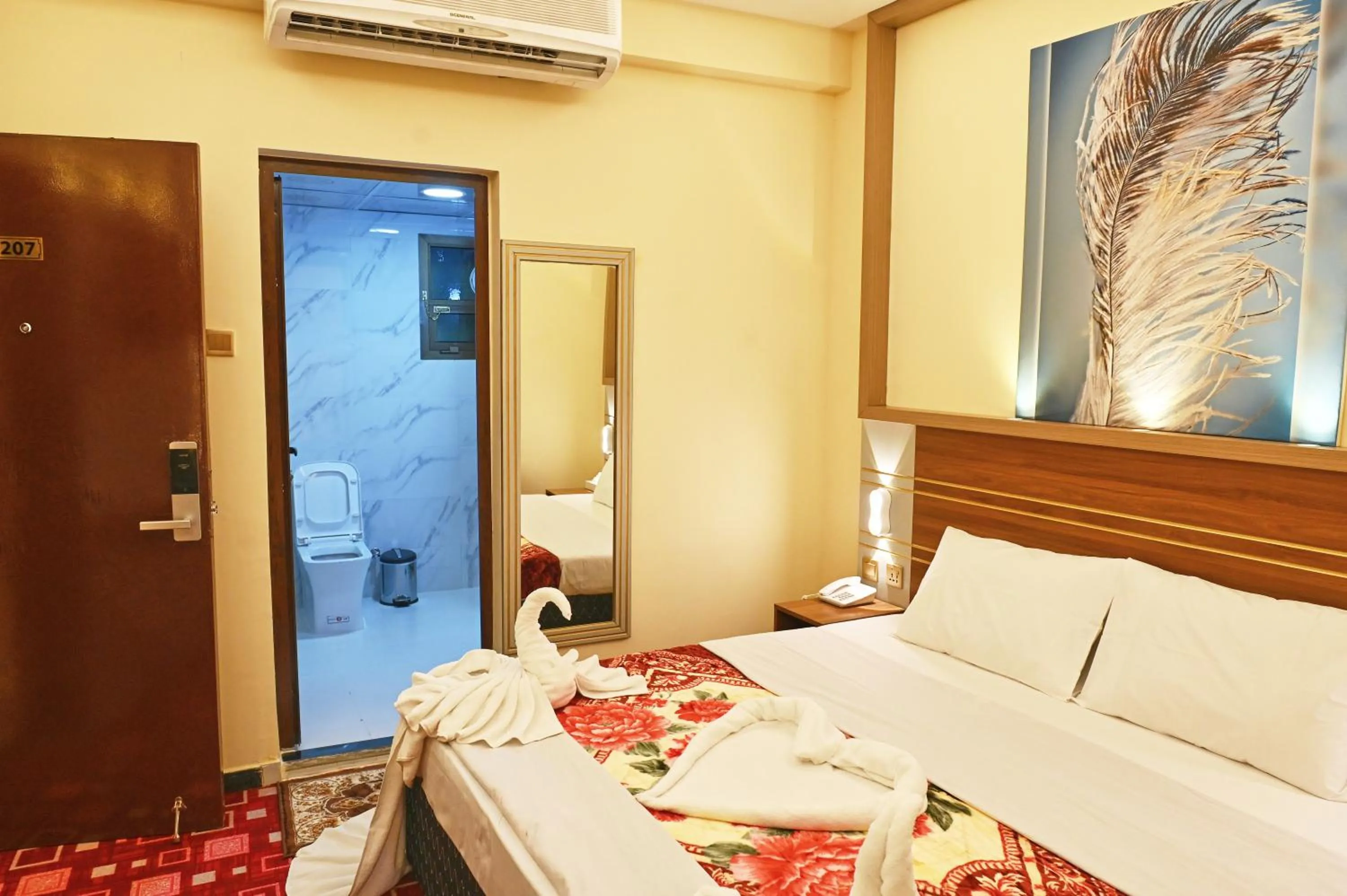 Bed in Tanha Palace Hotel