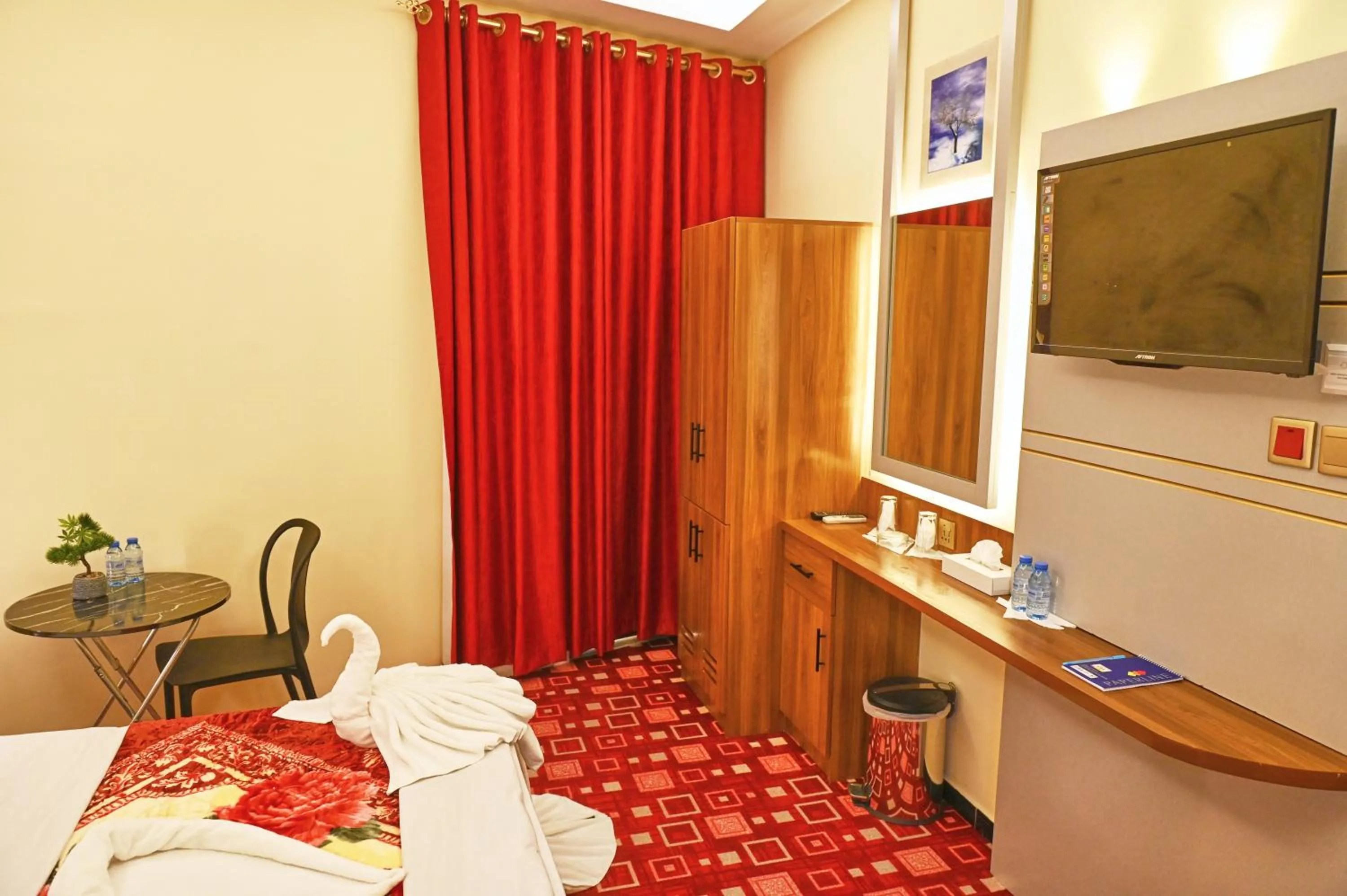 Bed in Tanha Palace Hotel