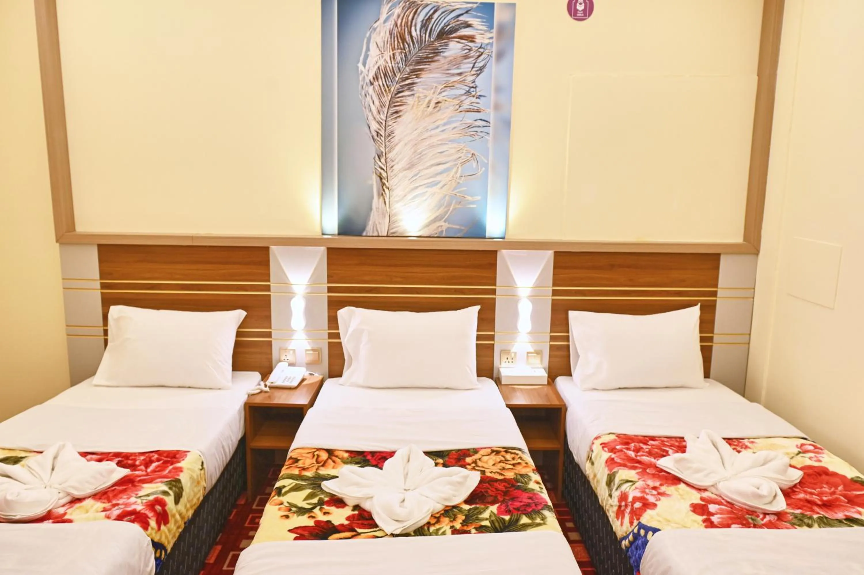 Bed in Tanha Palace Hotel