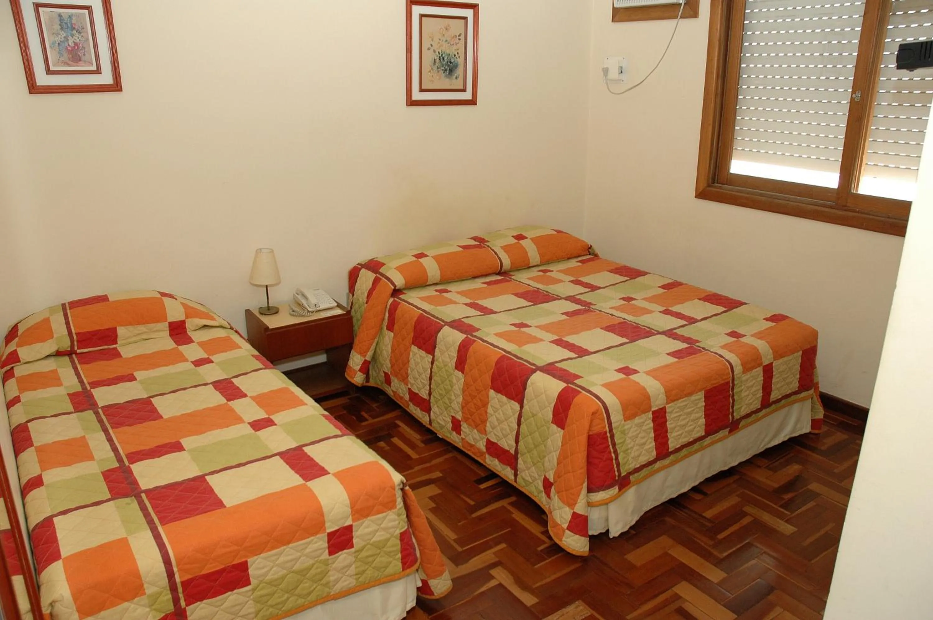 Photo of the whole room, Bed in Hotel Porto Alegre