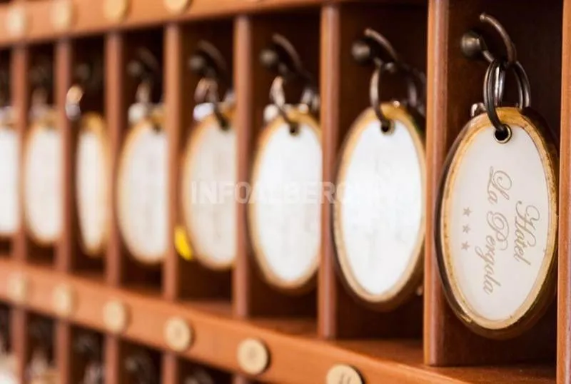 Property logo or sign in Hotel La Pergola