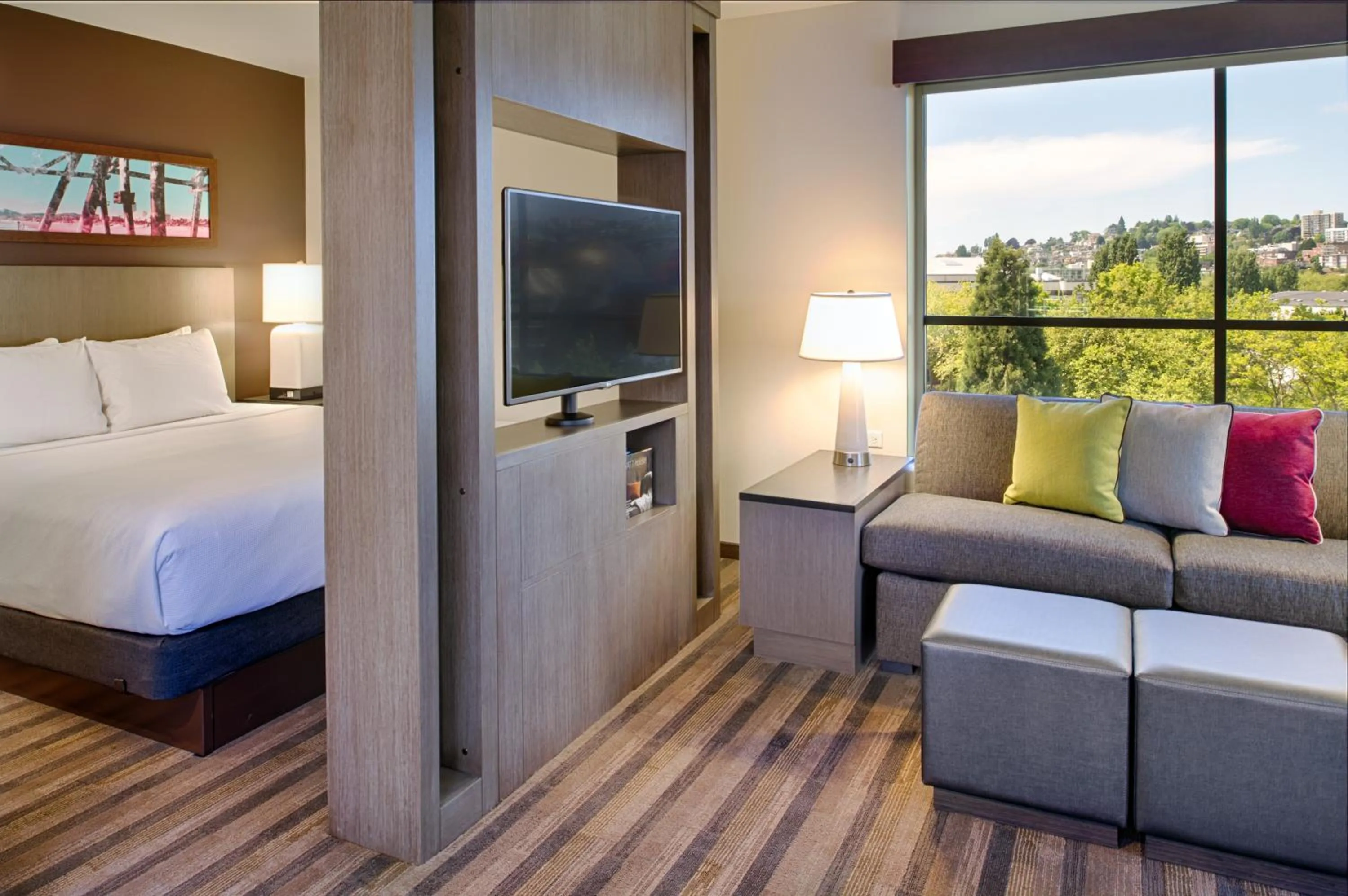 Living room, Bed in Hyatt House Seattle Downtown