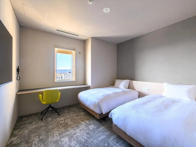 Bed in hotel miura kaen