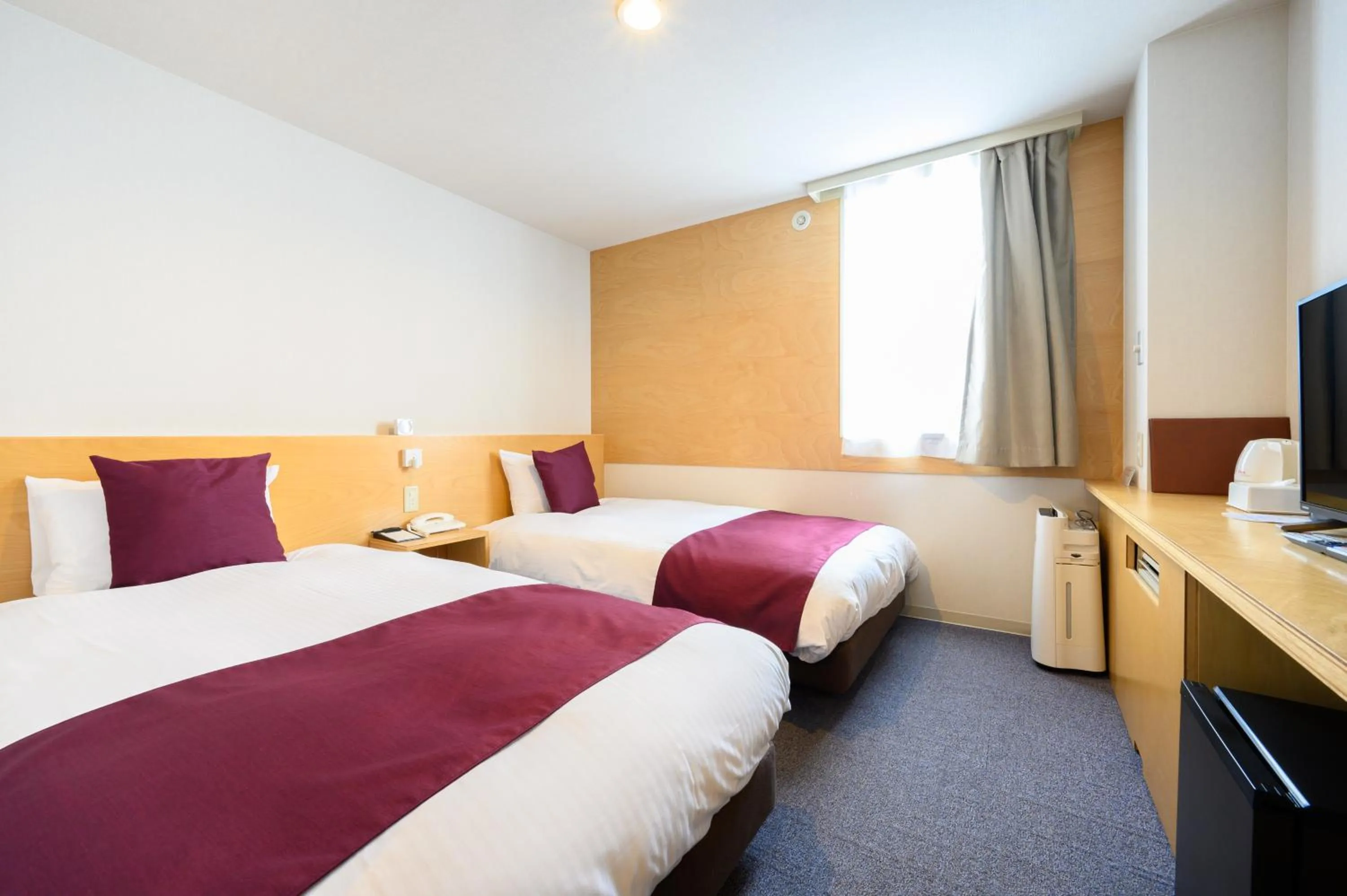 Bed in hotel miura kaen