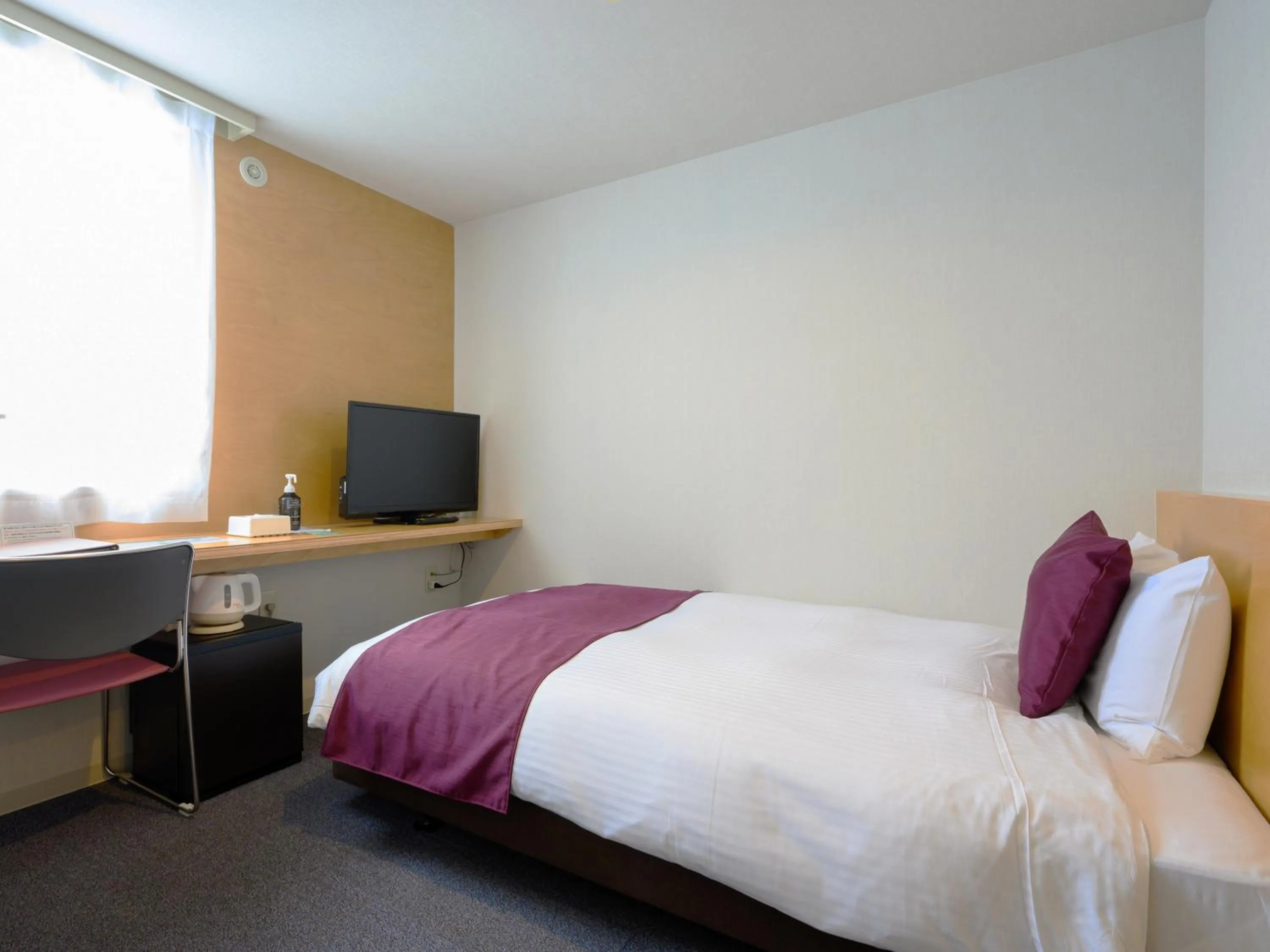 Photo of the whole room, Bed in hotel miura kaen