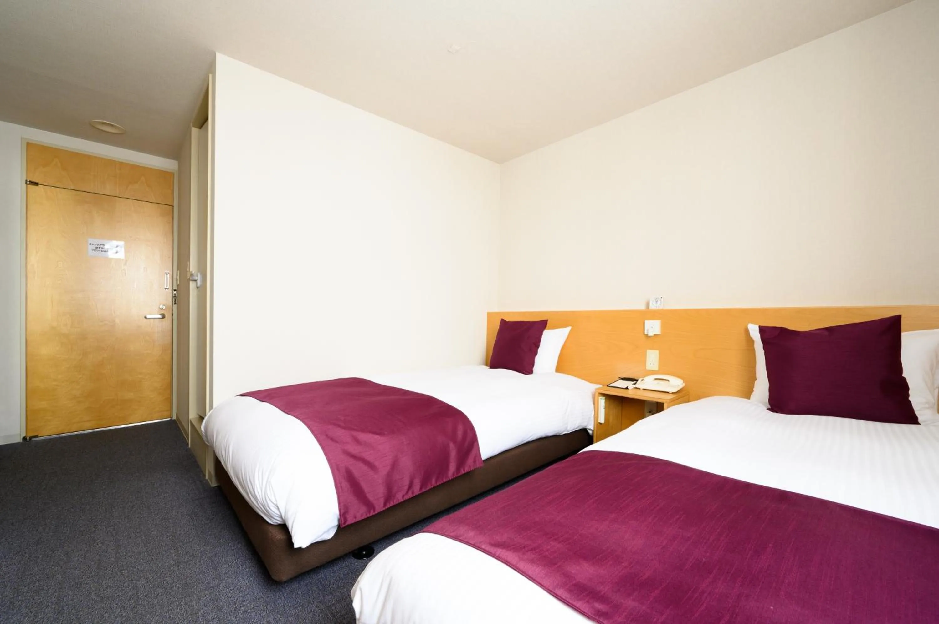 Bed in hotel miura kaen