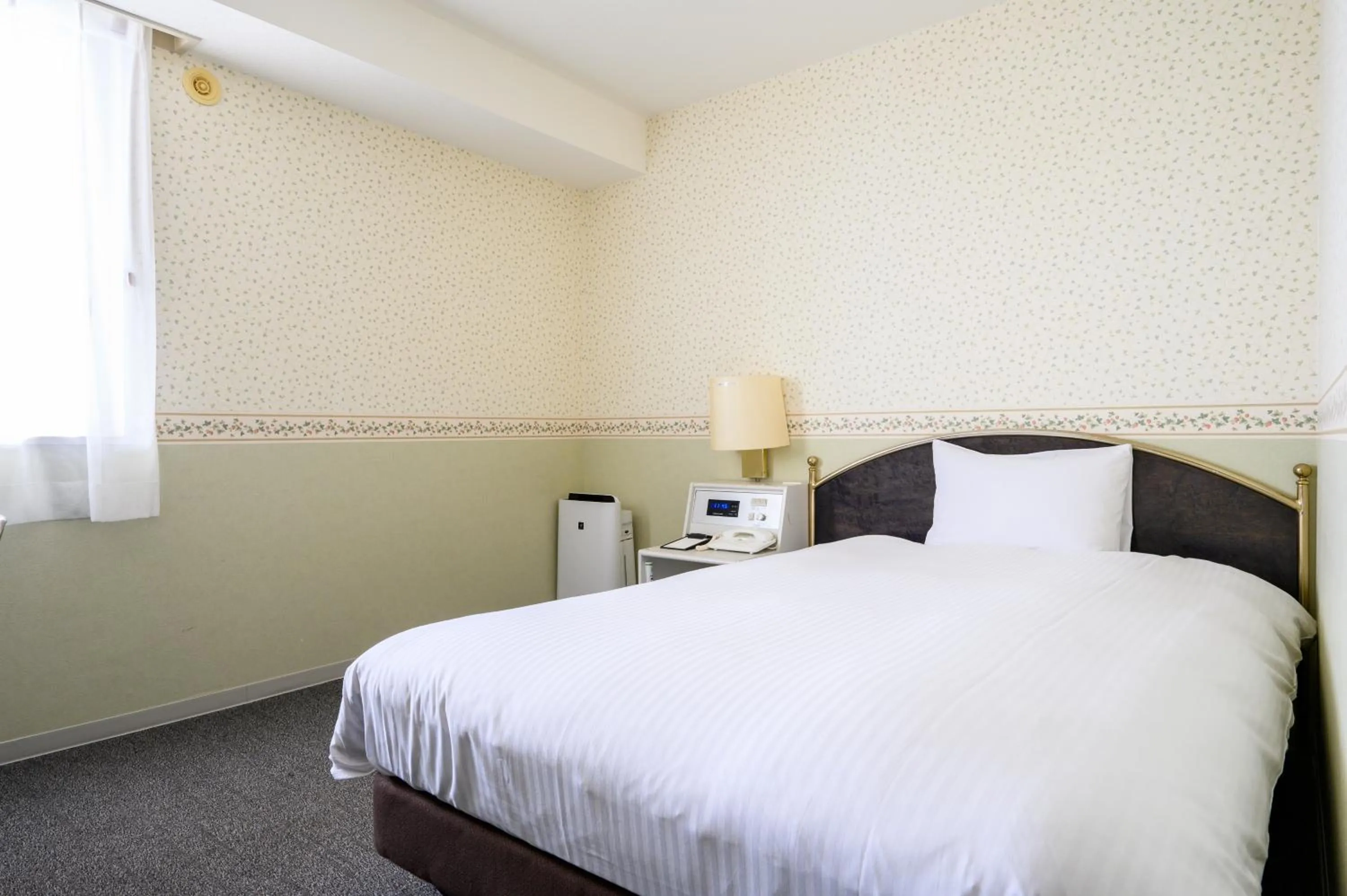 Bed in hotel miura kaen