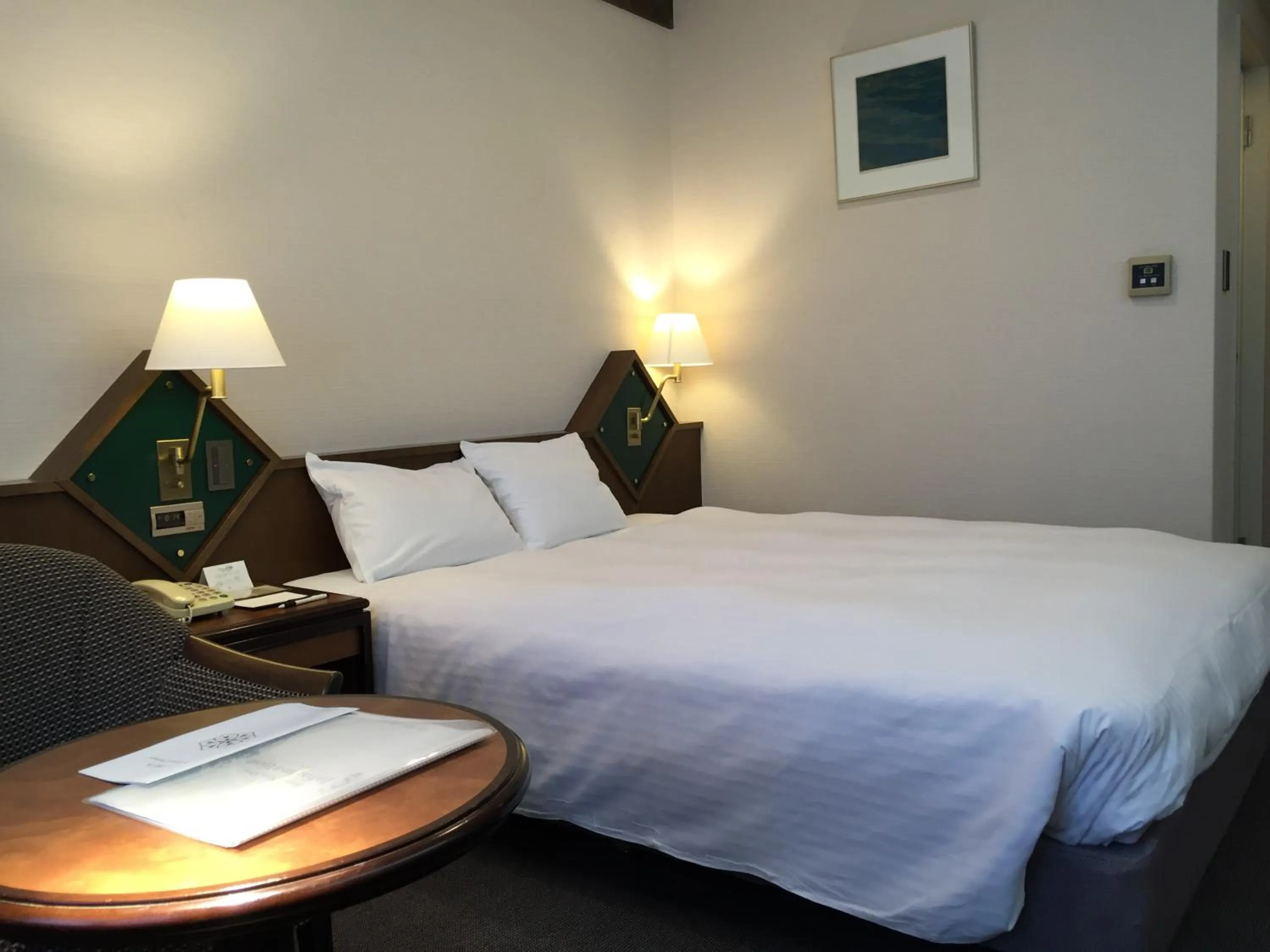 Bed in Hotel New Omi