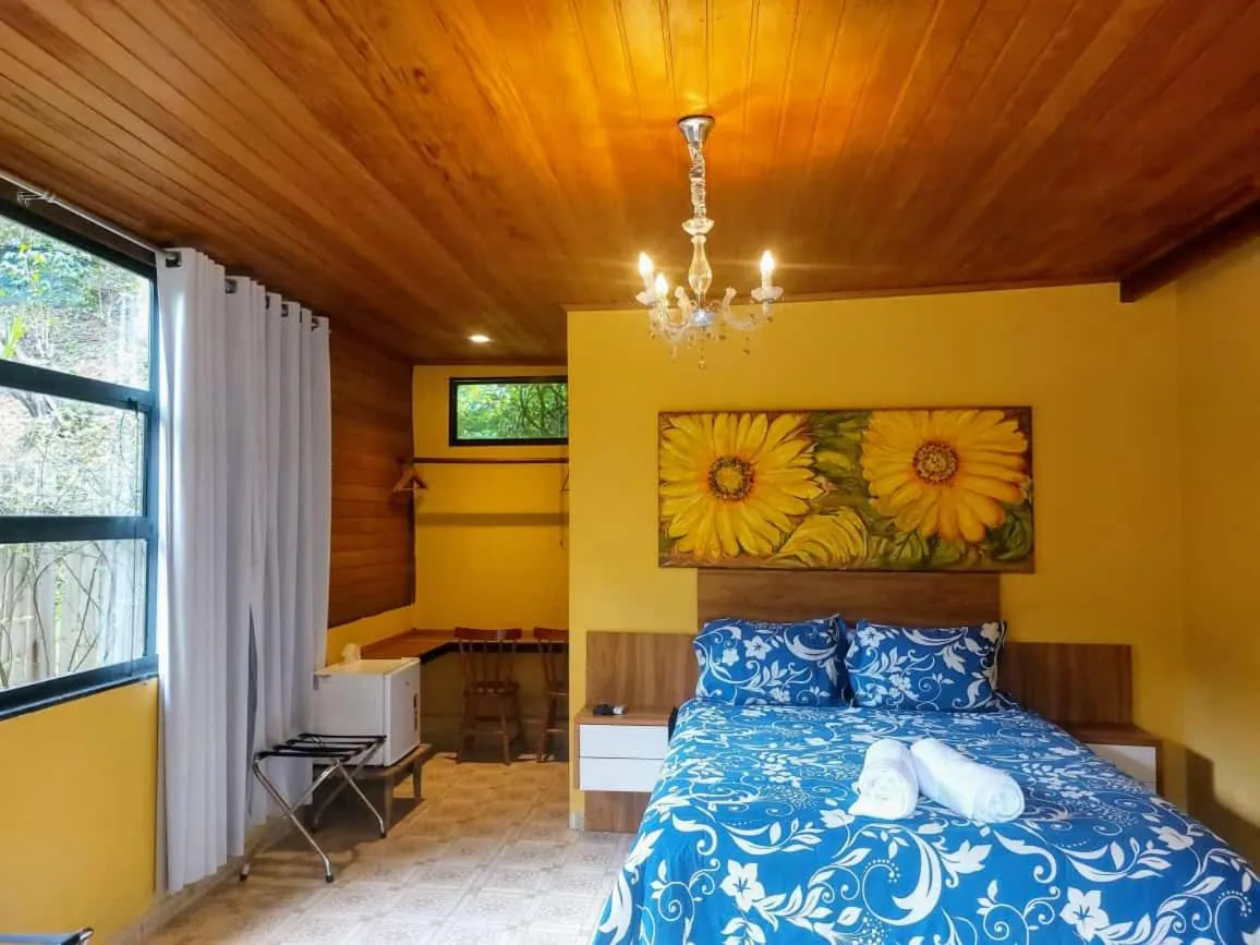 Photo of the whole room, Bed in Pousada Lisieux