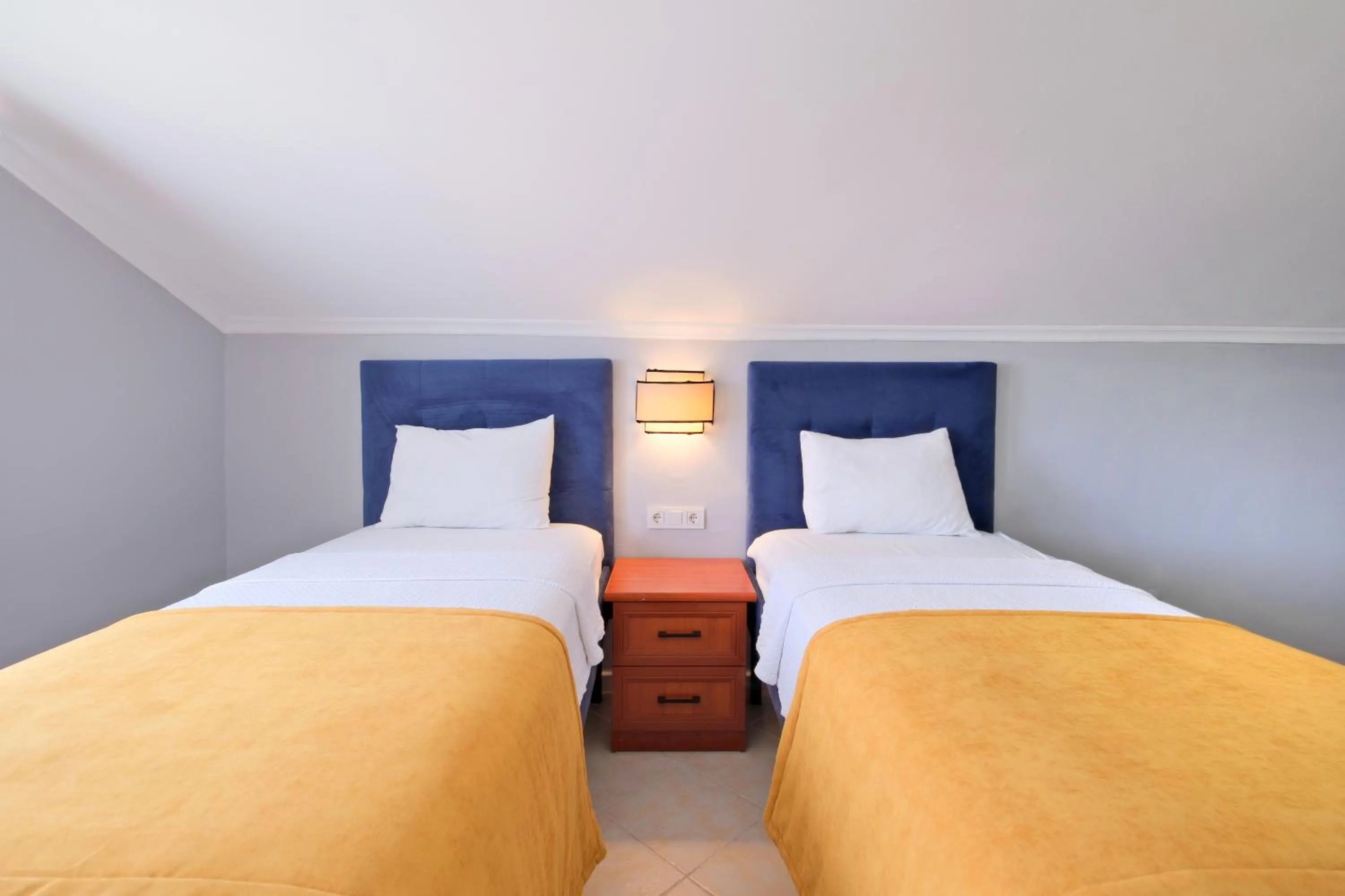 Bedroom in Gold Lion Apart Hotel