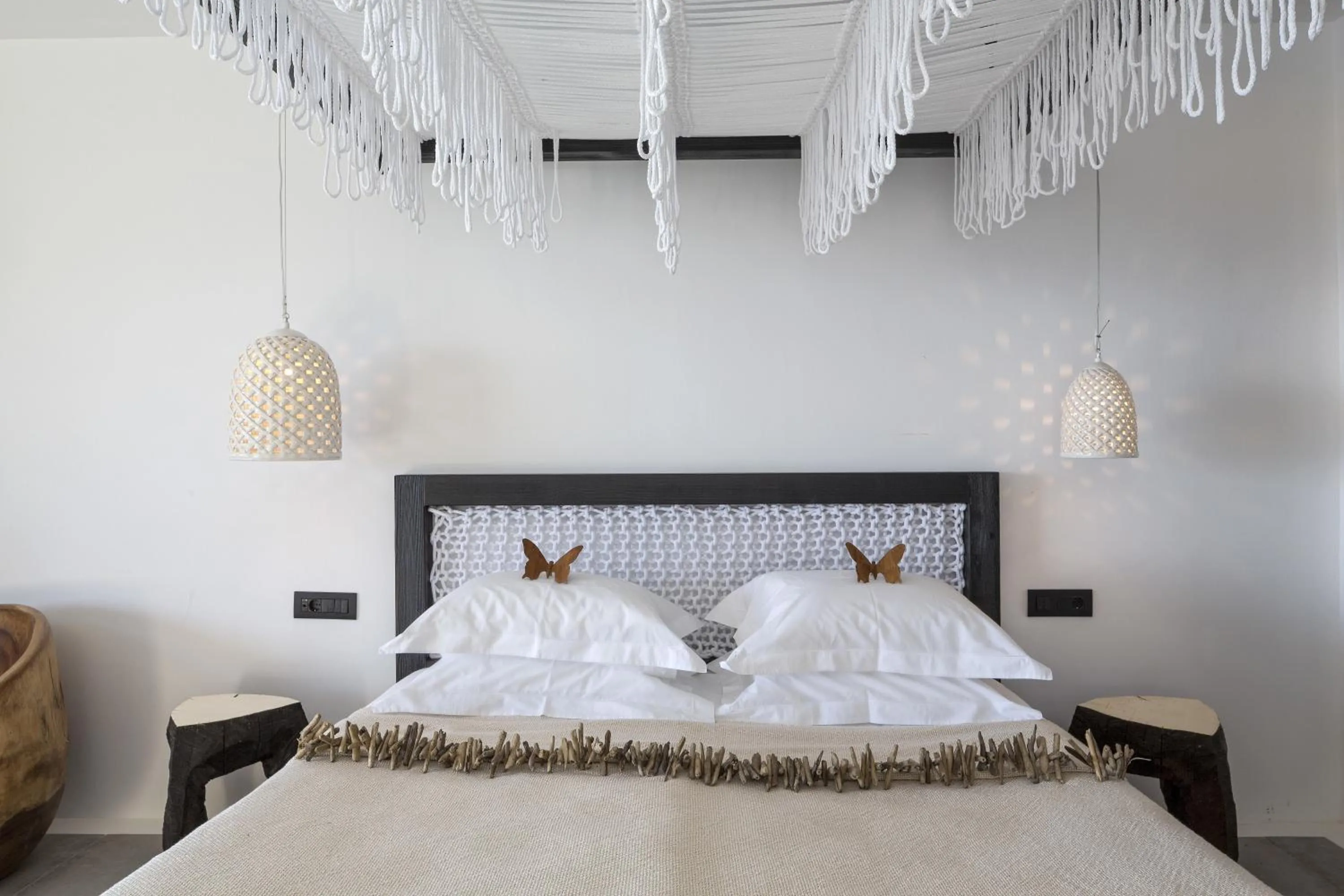 Bed in Myconian Utopia Relais & Chateaux