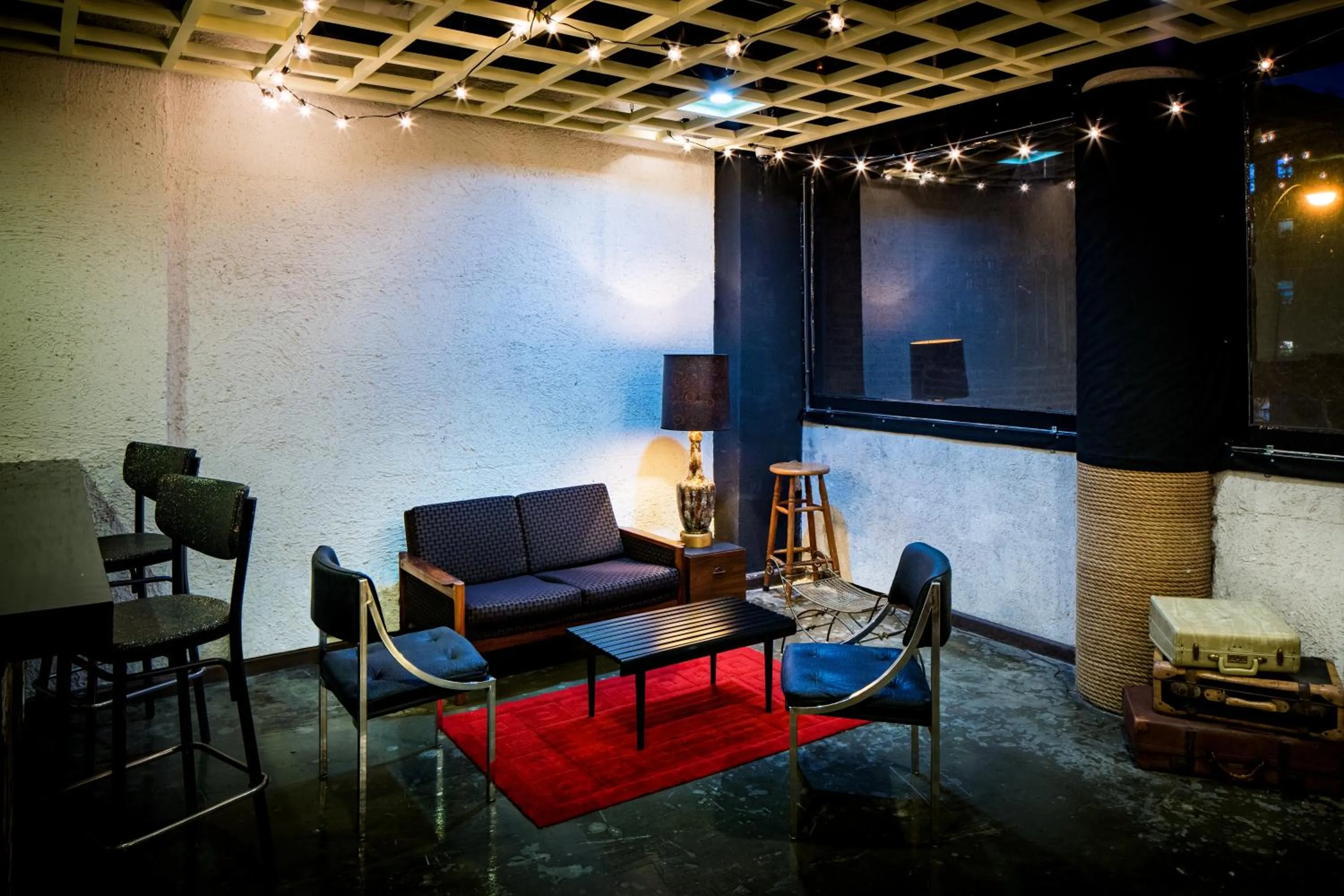 Communal lounge/ TV room in Orchard Street Hotel