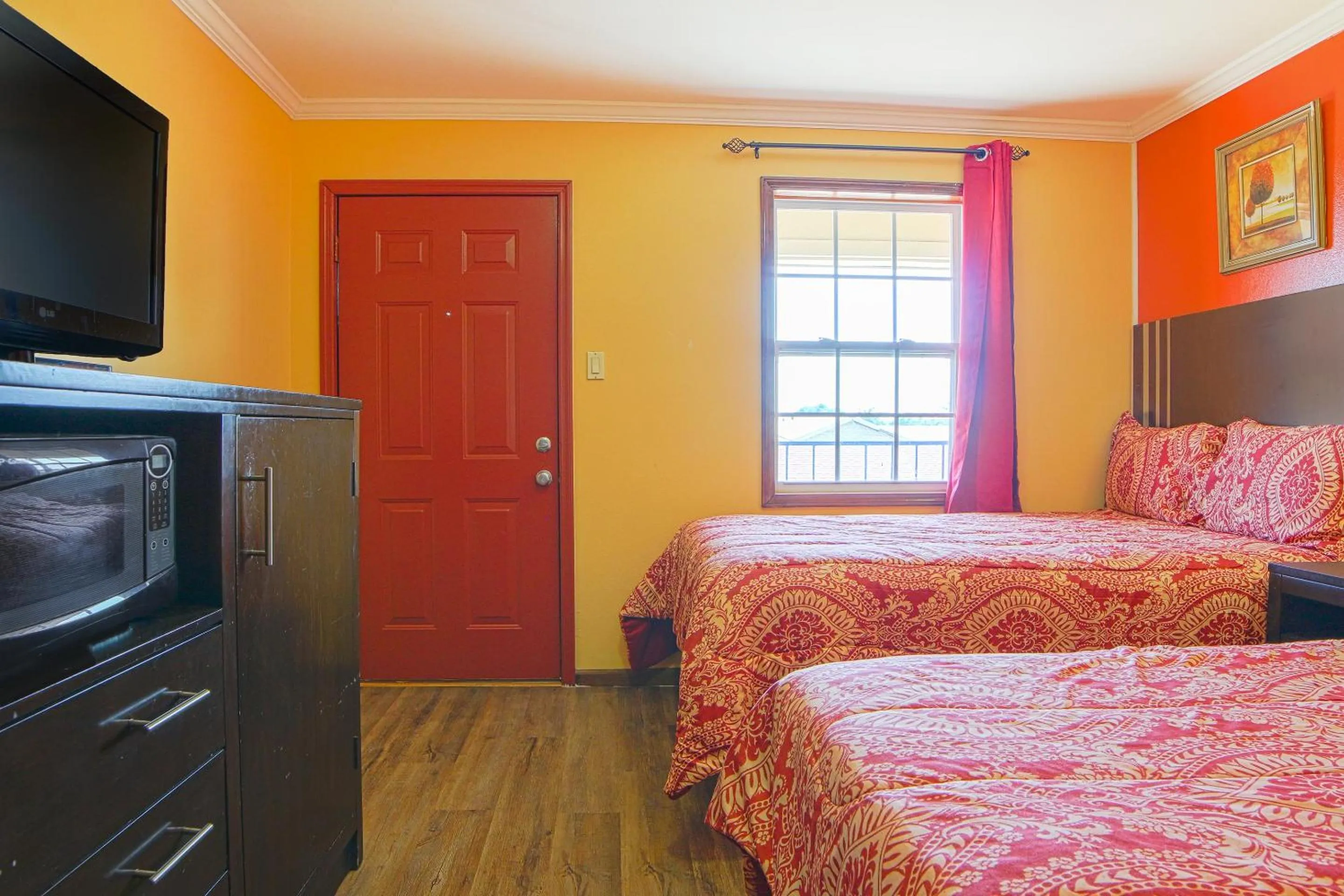 Bedroom, Bed in Economy Inn By OYO Lockport near Houma