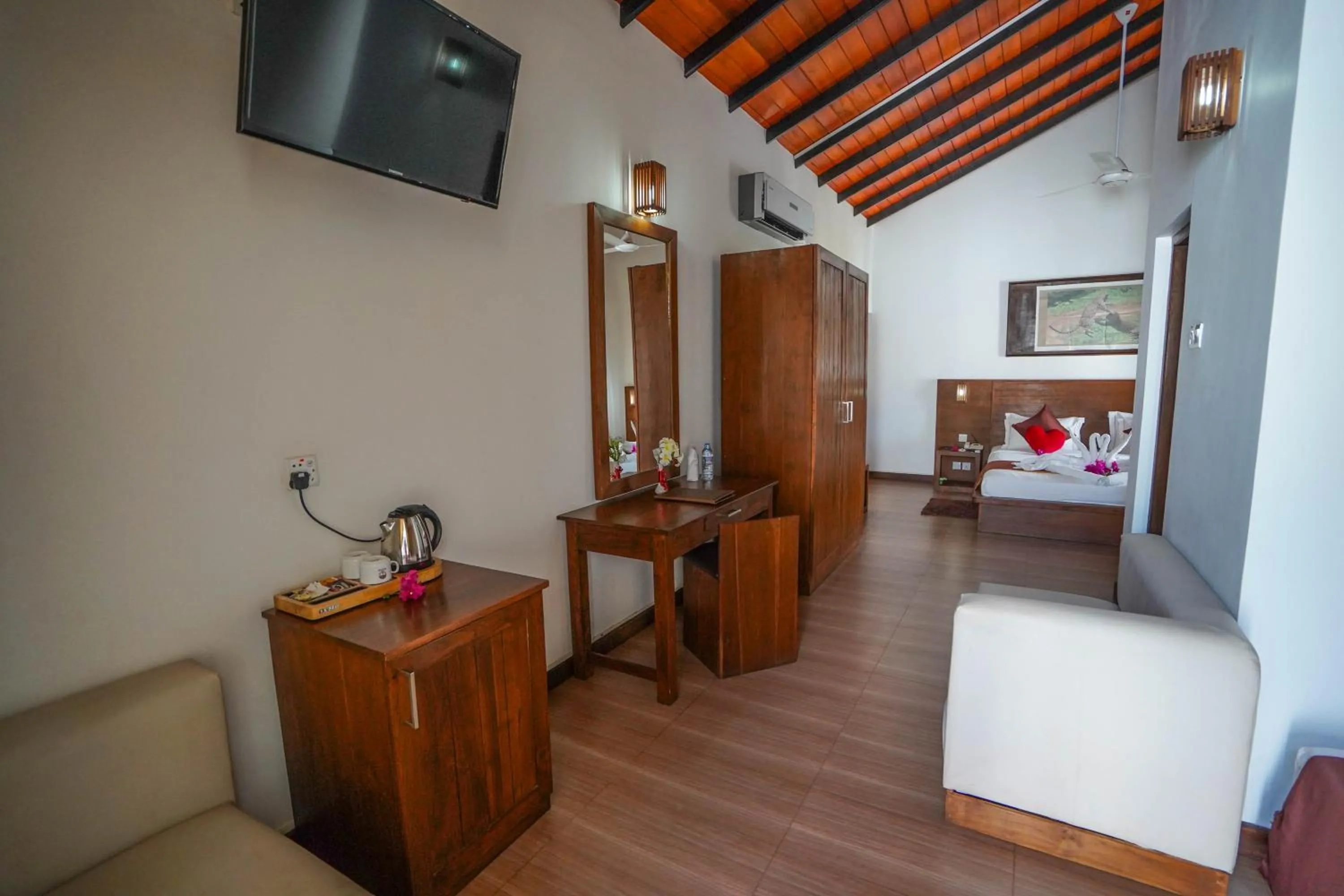 Living room, Bed in Hotel Tamarind Tree