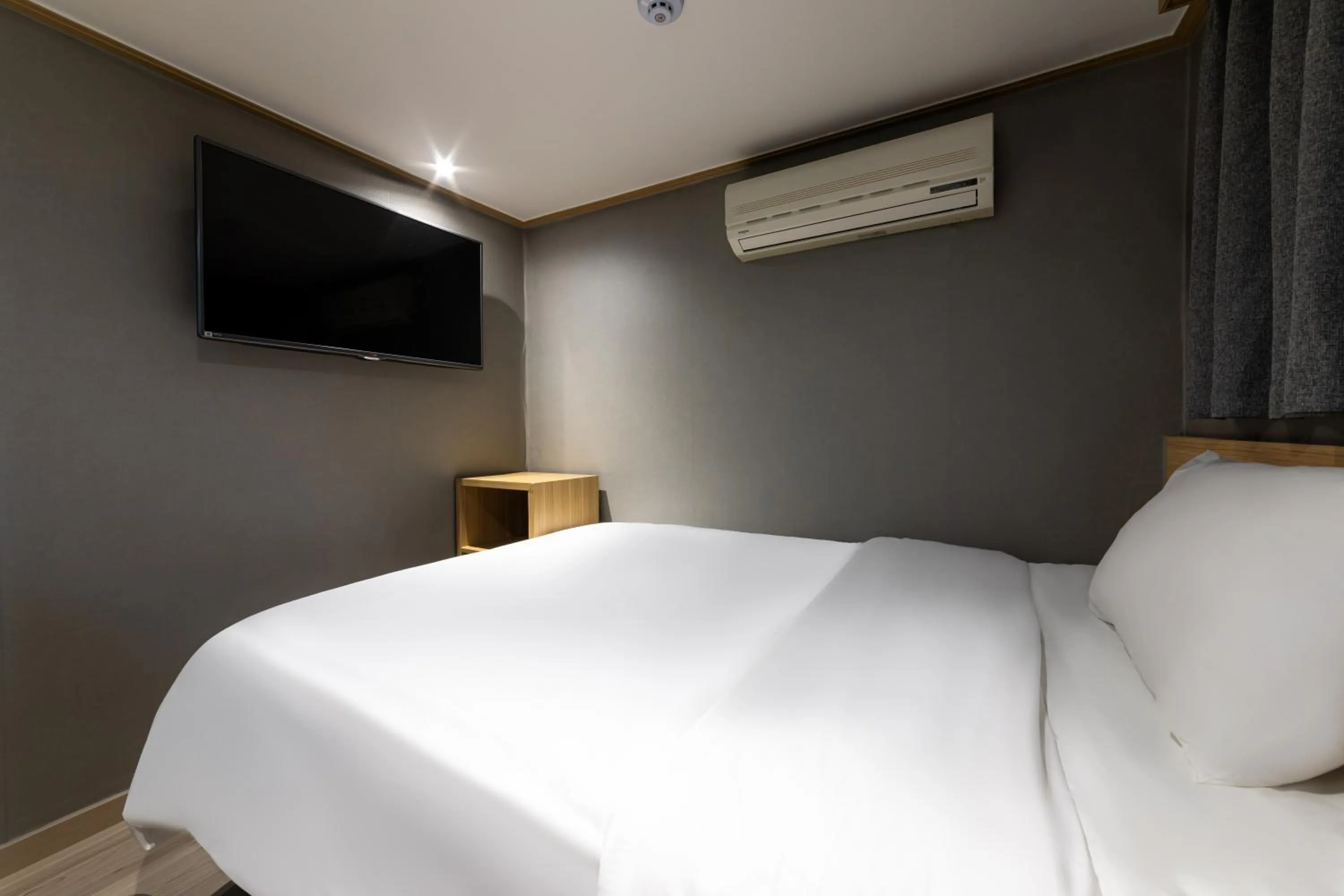 Bed in About Stay Seoul
