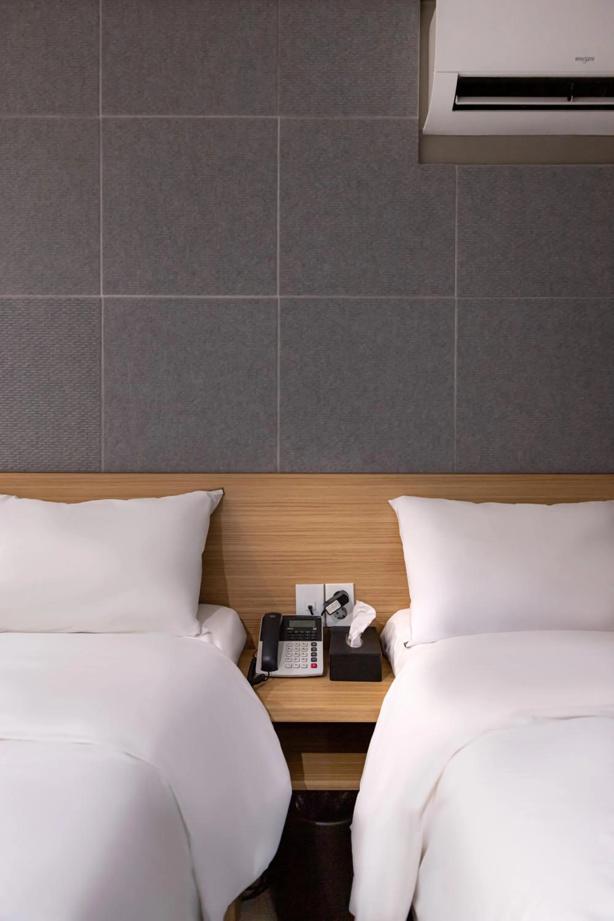 Bed in About Stay Seoul