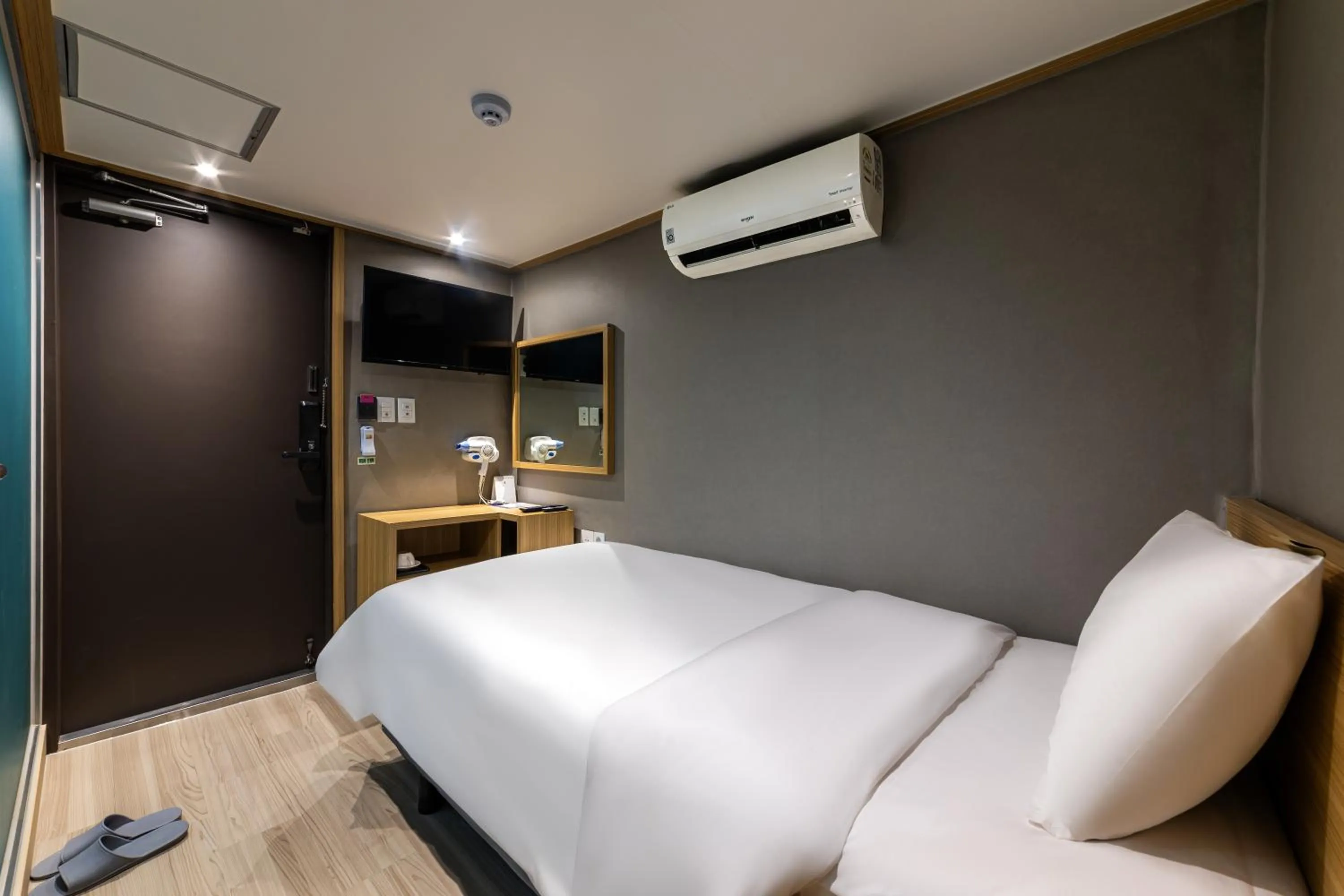 Bed in About Stay Seoul