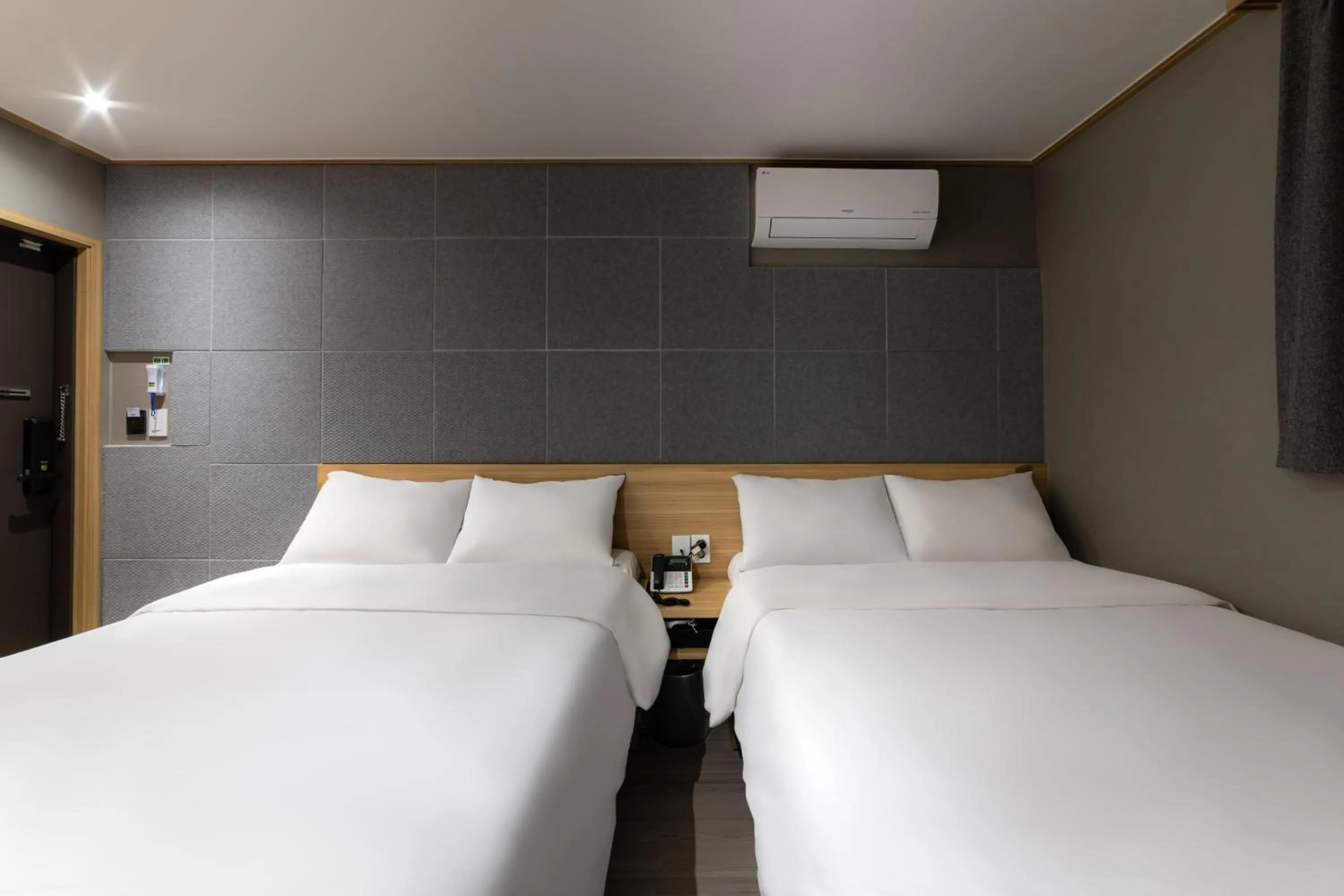 Bed in About Stay Seoul