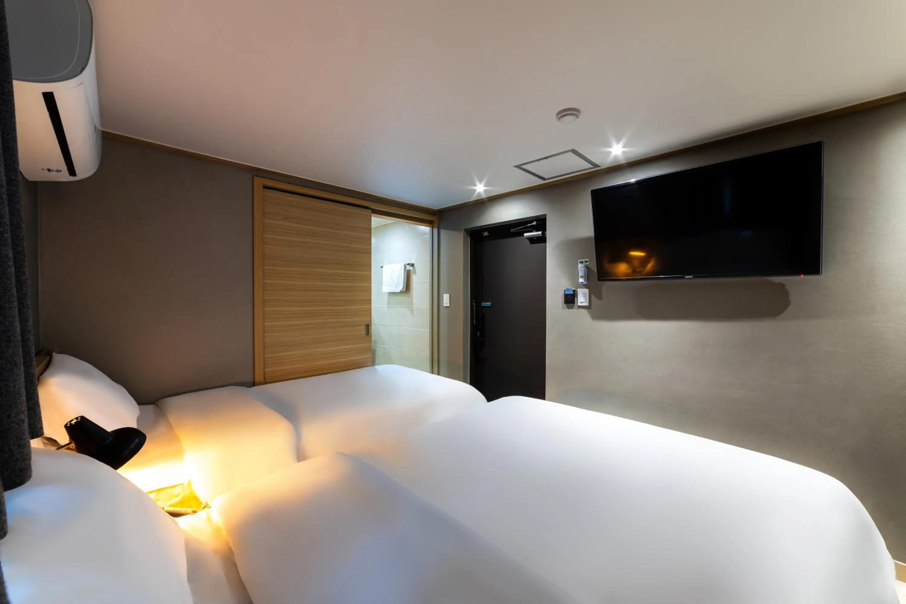 Bed in About Stay Seoul