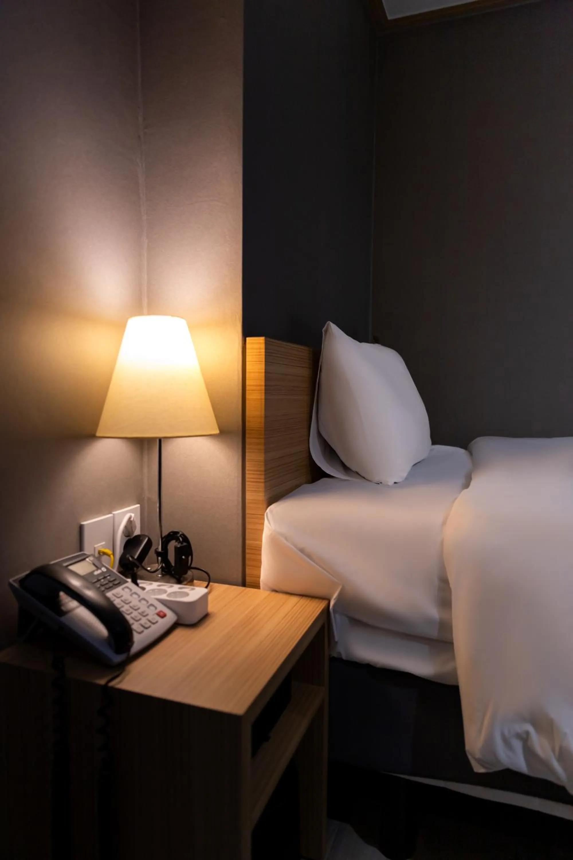 Bed in About Stay Seoul